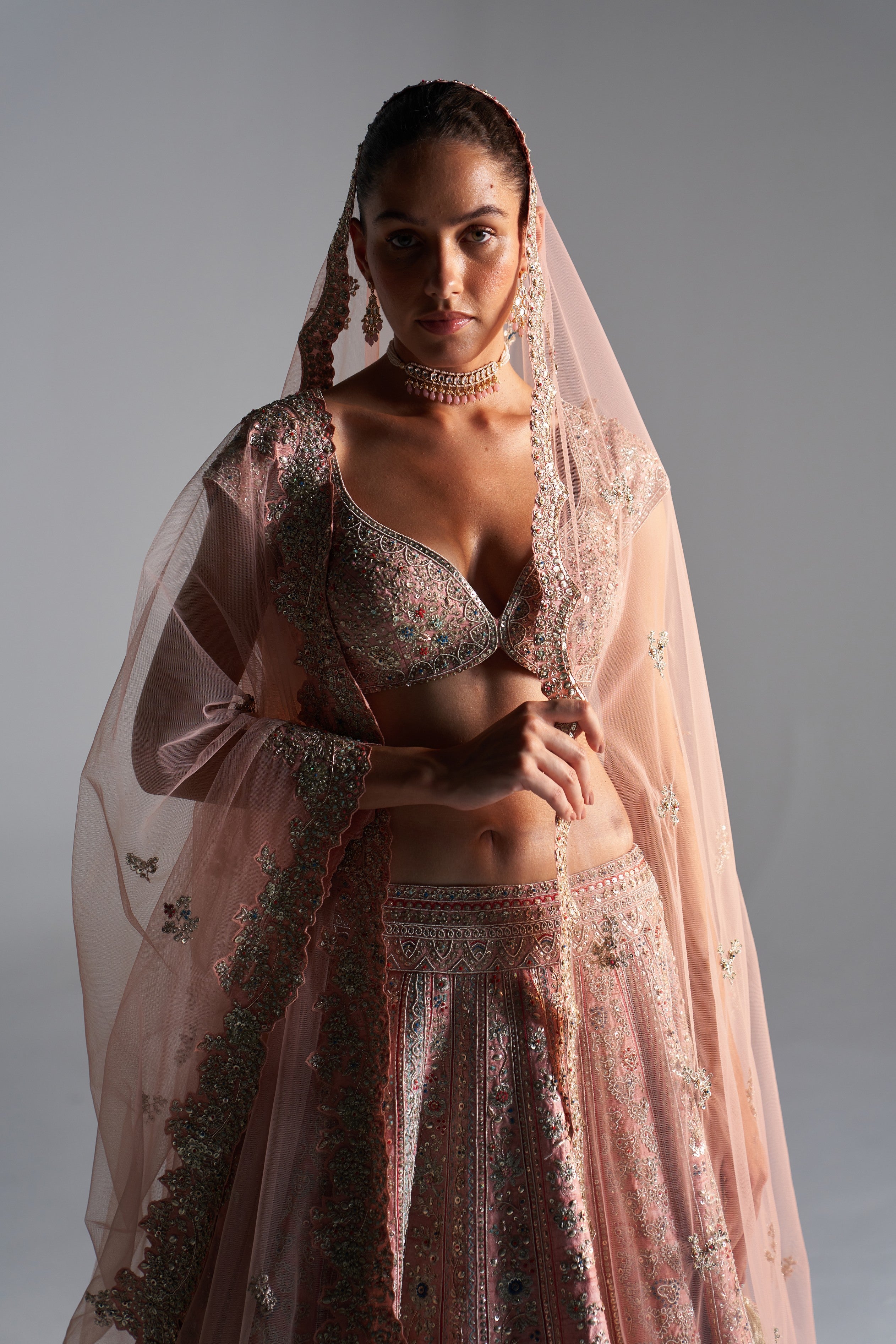 Coral rose
raw silk lehenga set