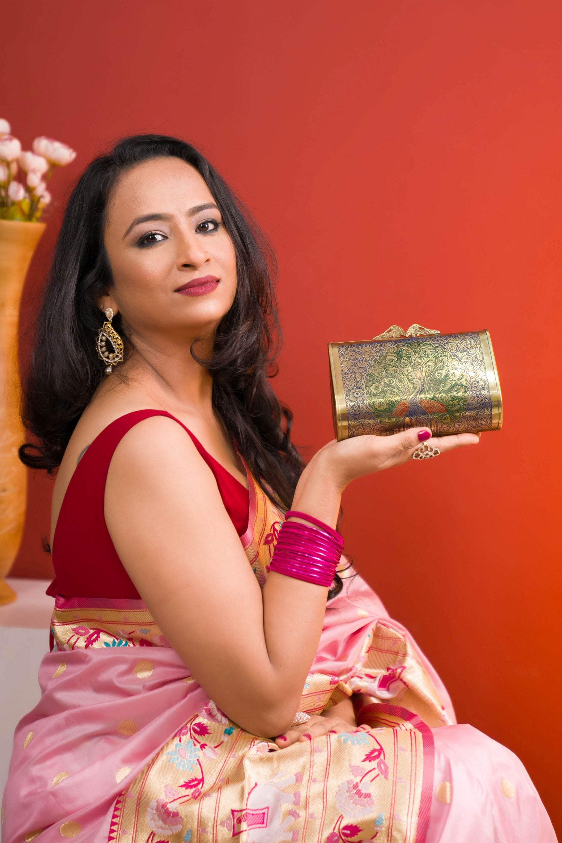ETHNIC PEACOCK ENGRAVED BRASS CLUTCH