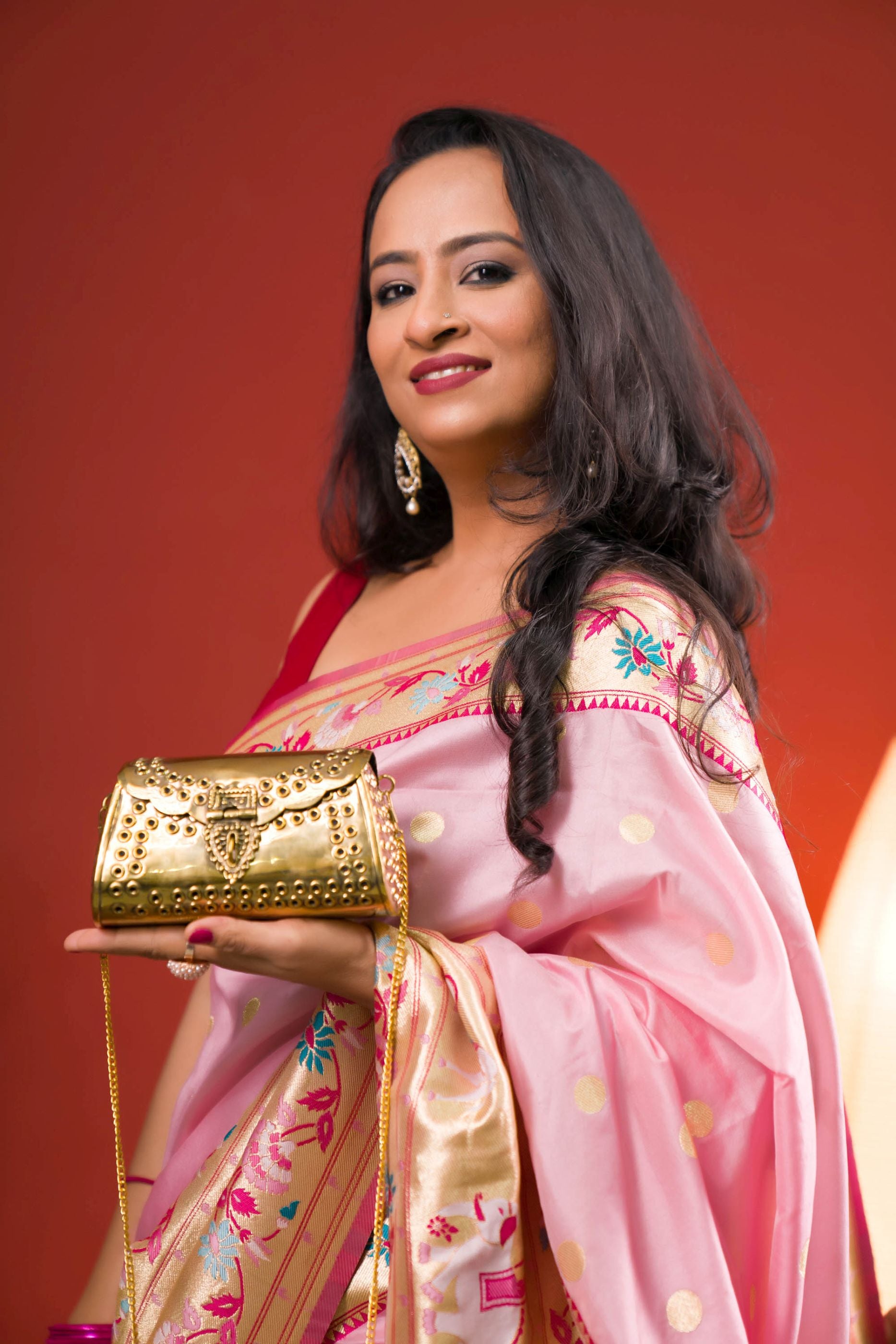 Punched rivet gold brass hangbag