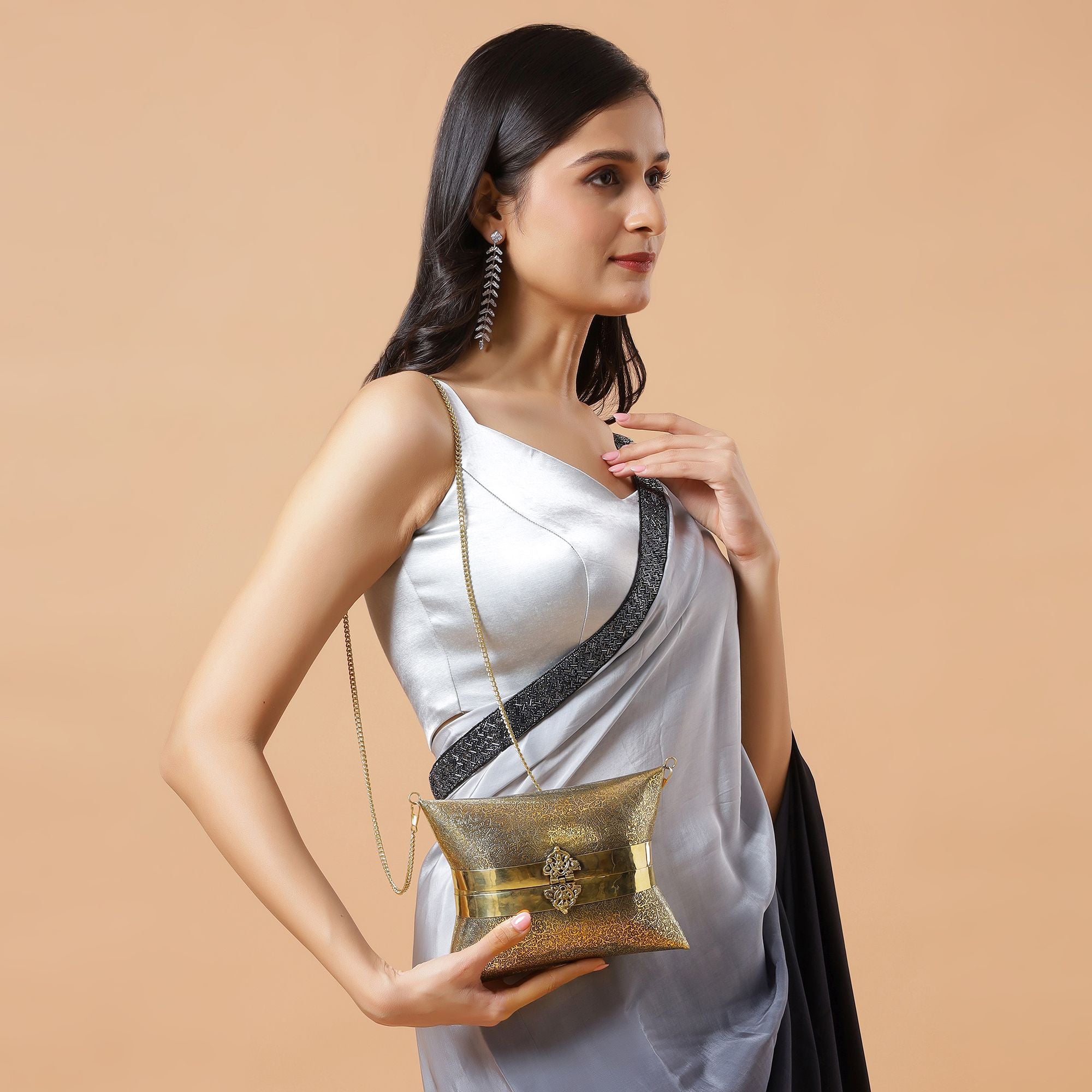 ETHNIC BRASS BAG WITH INTRICATE PATTERN IN GOLD FINISH