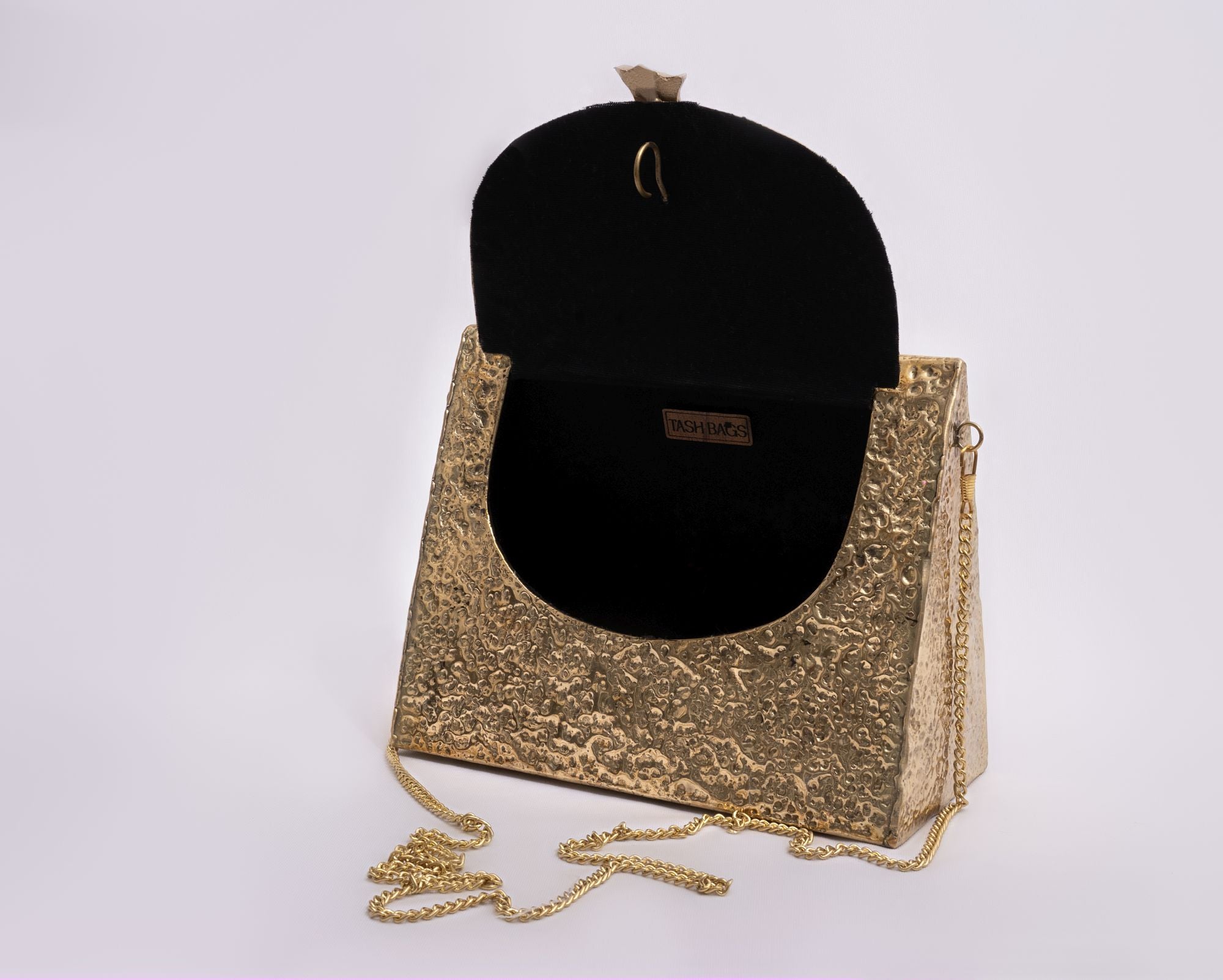 TRIANGLE HAMMERED BRASS BOW BAG IN GOLD