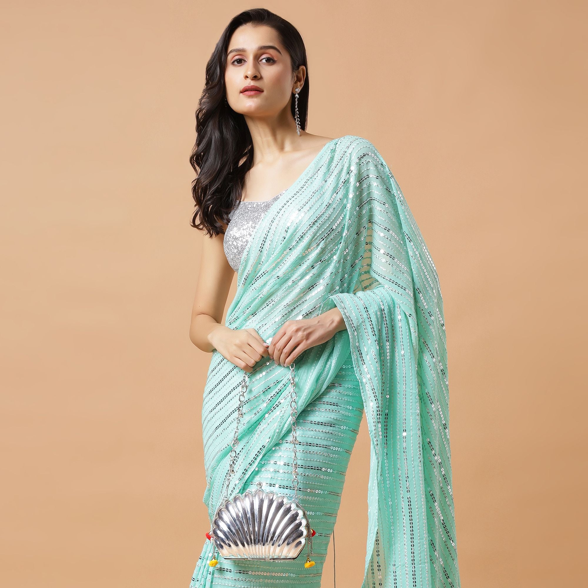 ETHNIC GHUNGROO BRASS BAG IN SILVER FINISH