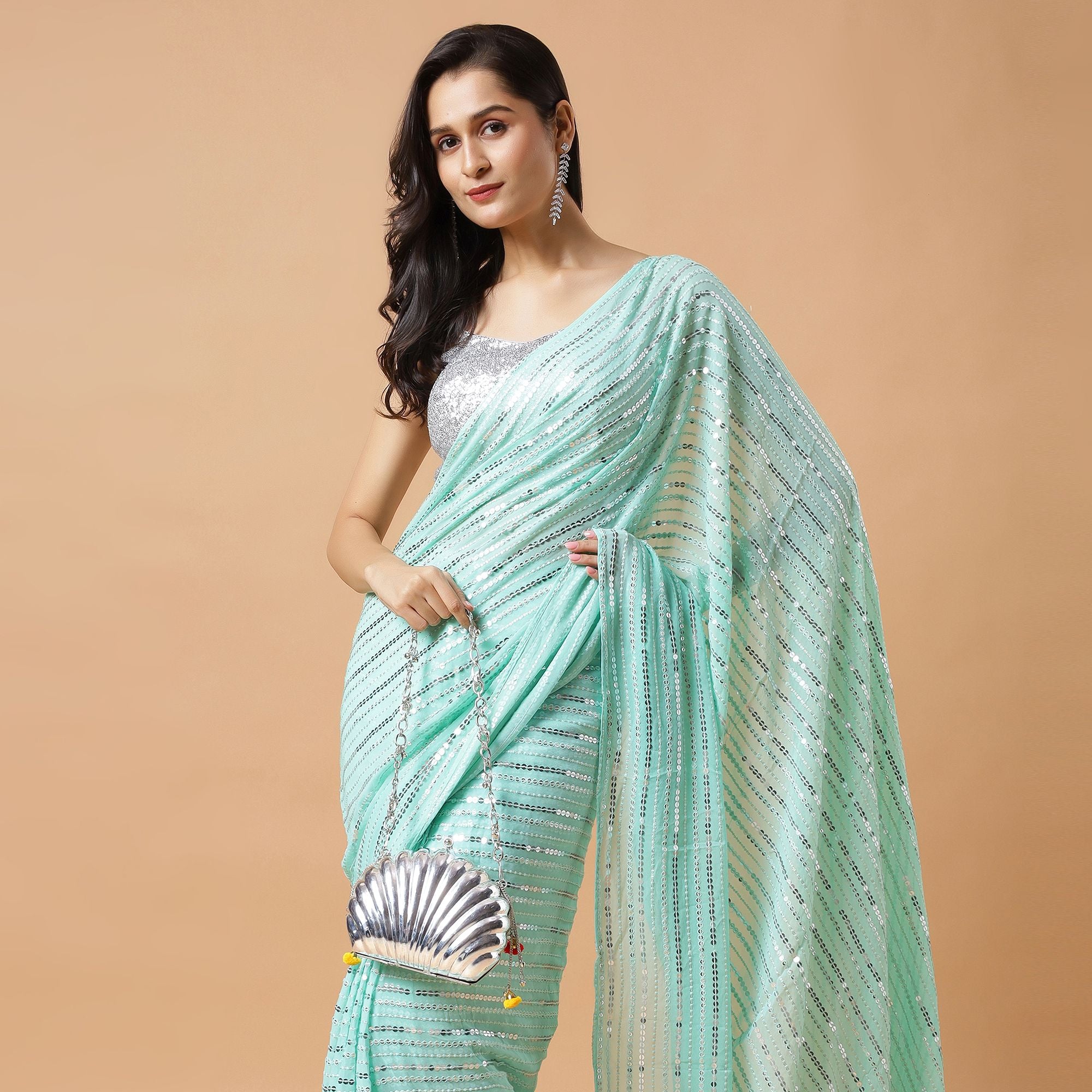 ETHNIC GHUNGROO BRASS BAG IN SILVER FINISH