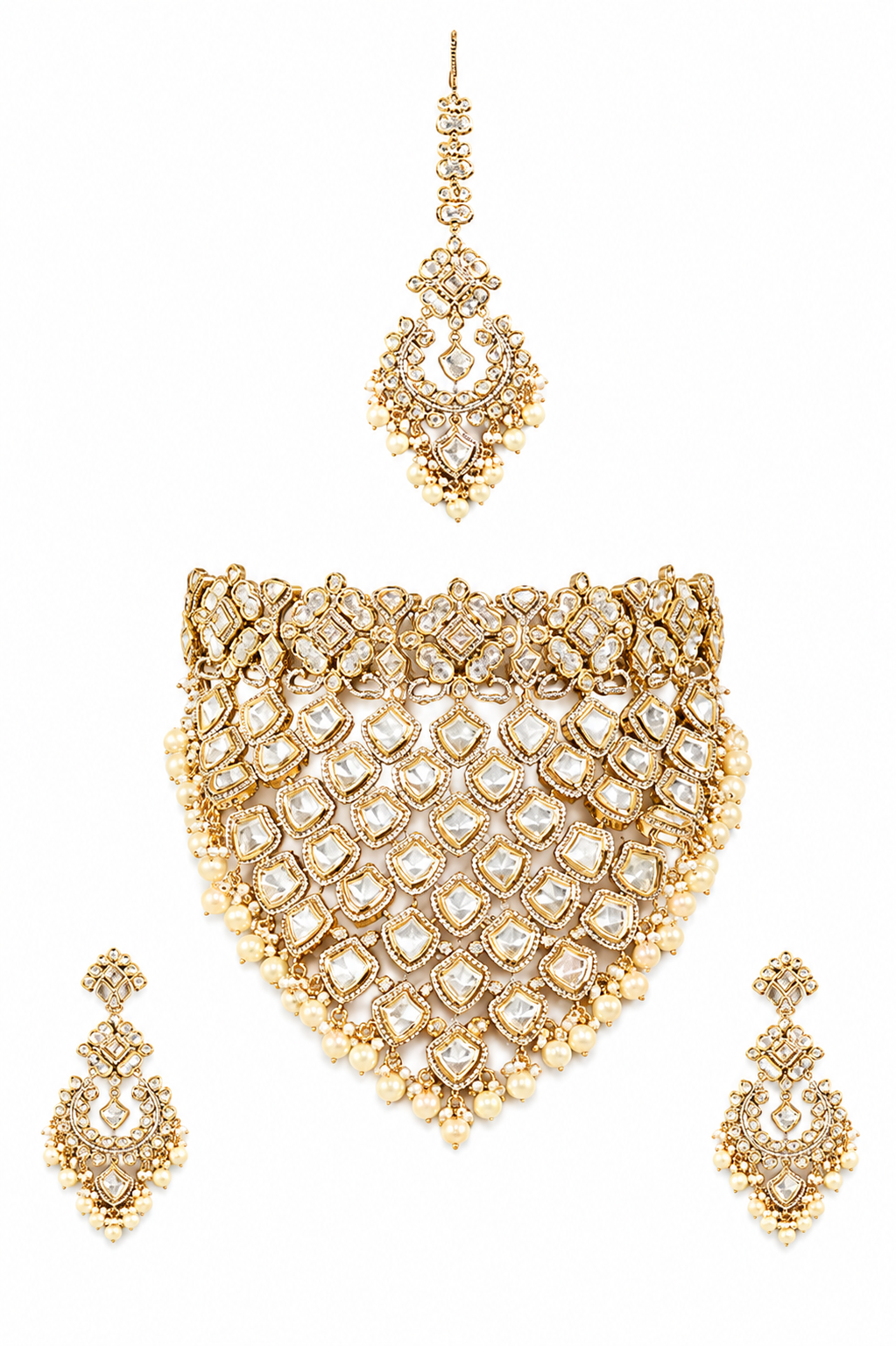 Bold and dramatic polki bridal necklace set with matching earrings and maangtika