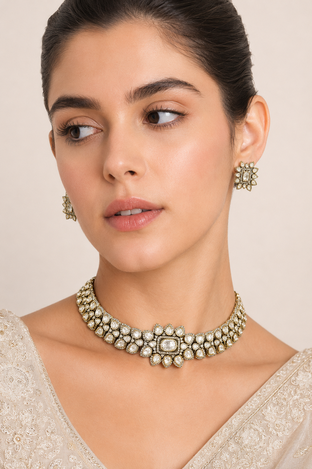Elegant yet dramatic polki choker set with matching earrings