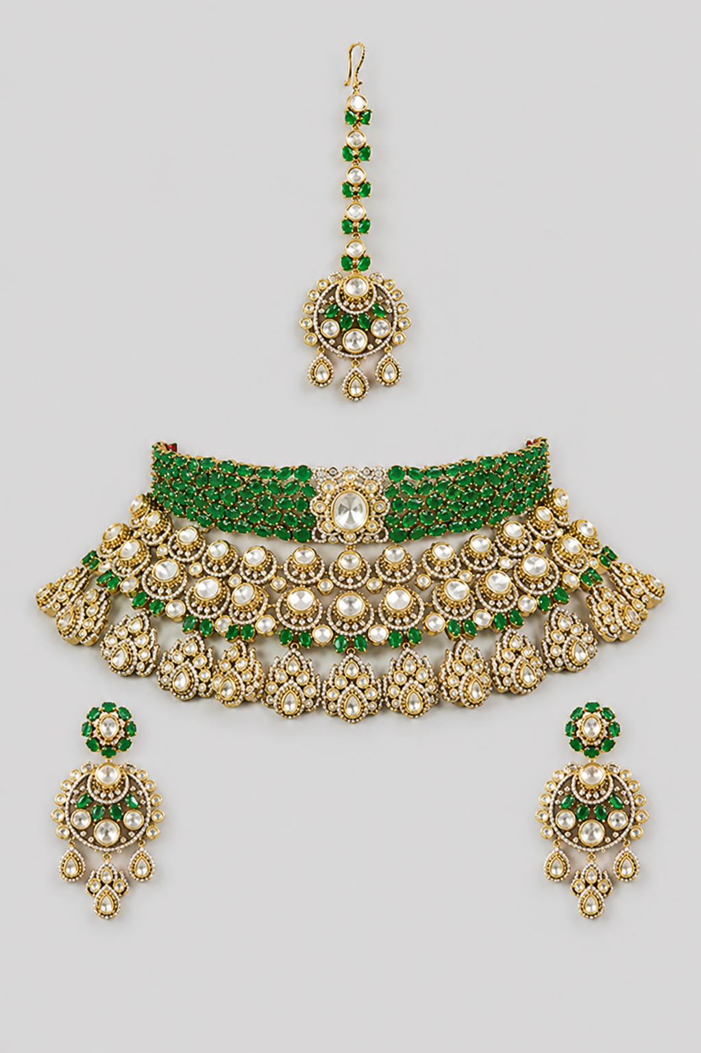 Bold and dramatic polki bridal necklace set with matching earrings and maangtika