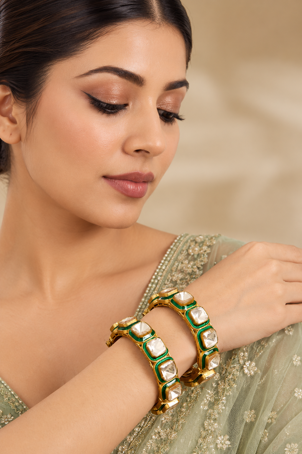 Bold and dramatic pair of kundan polki kadas with green meenakari