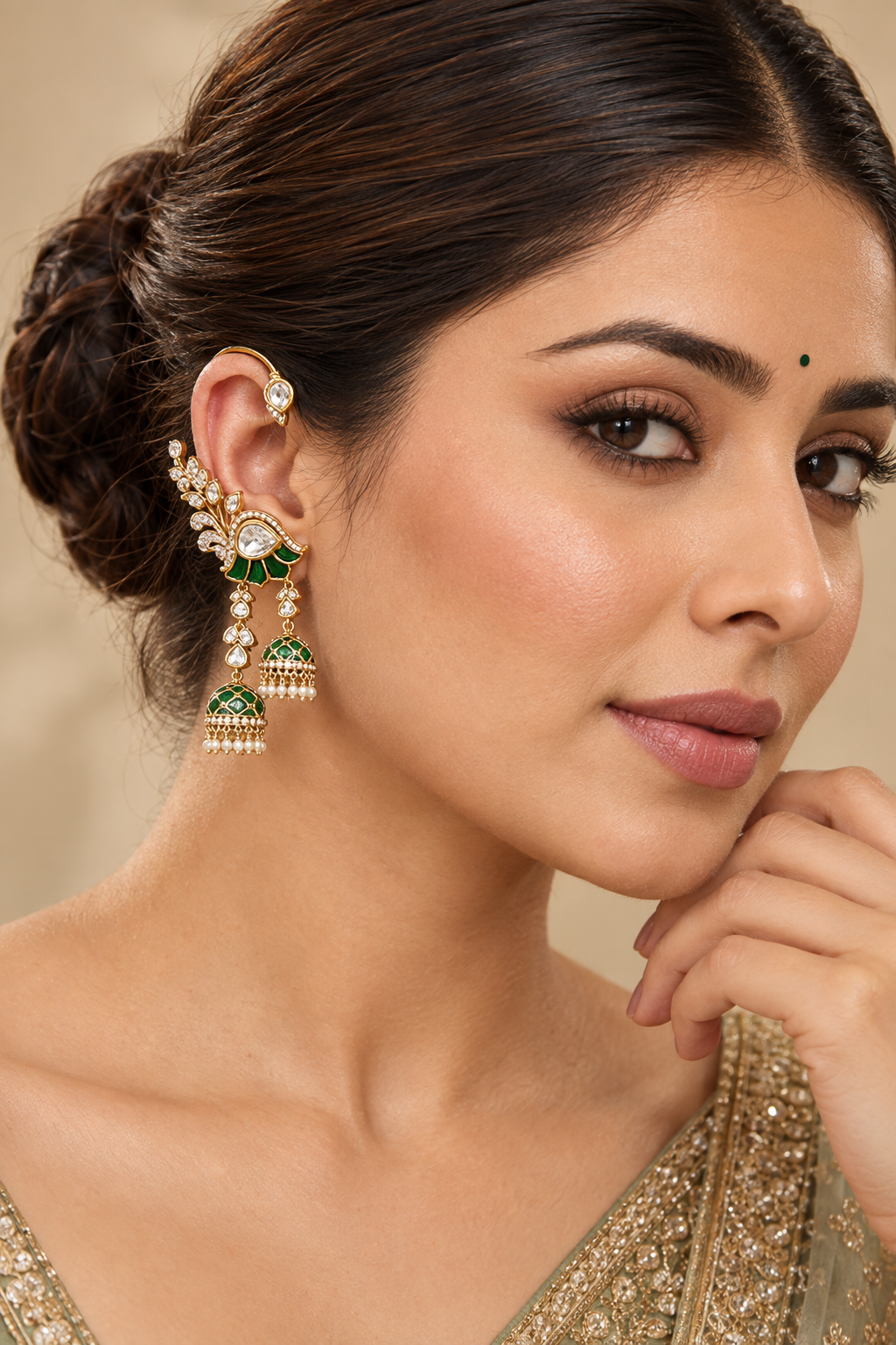 Traditional yet bold pair of gold finish kundan meenakari earcuffs