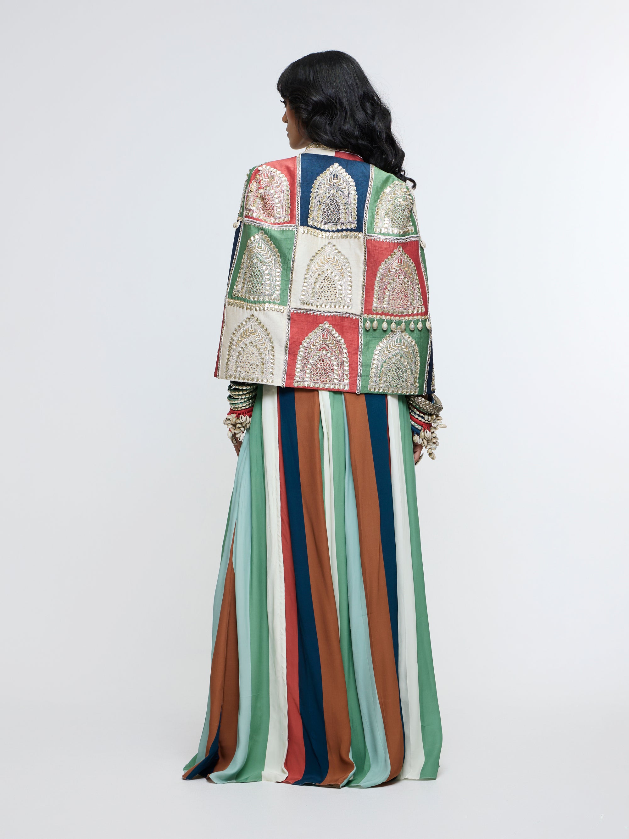 RAJRANGI EMBELLISHED CAPE JACKET PAIRED WITH EMBELLISHED BUSTIER AND PLEATED PANTS