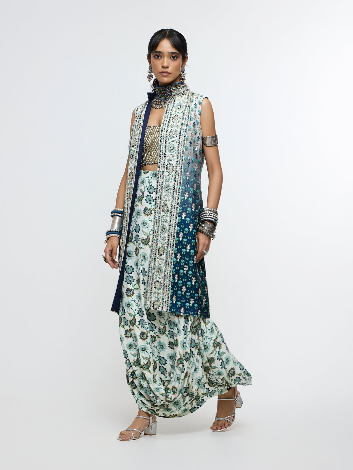 NYSA LONG JACKET PAIRED WITH METALLIC BUSTIER & DRAPE SKIRT