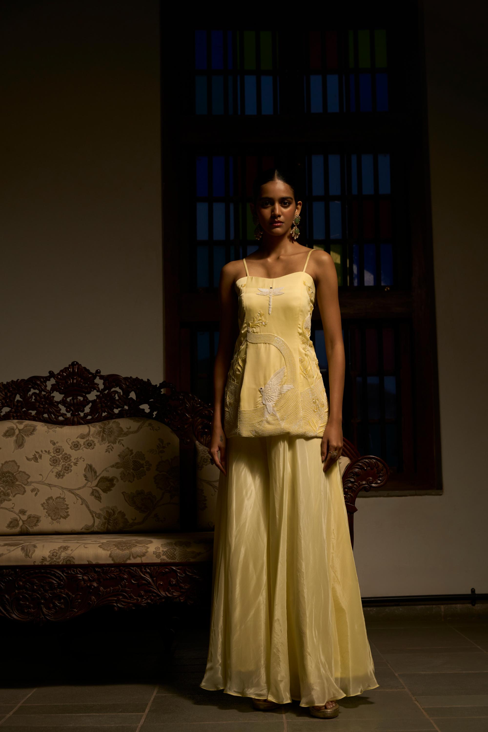 Peplum top with flarred plazzo