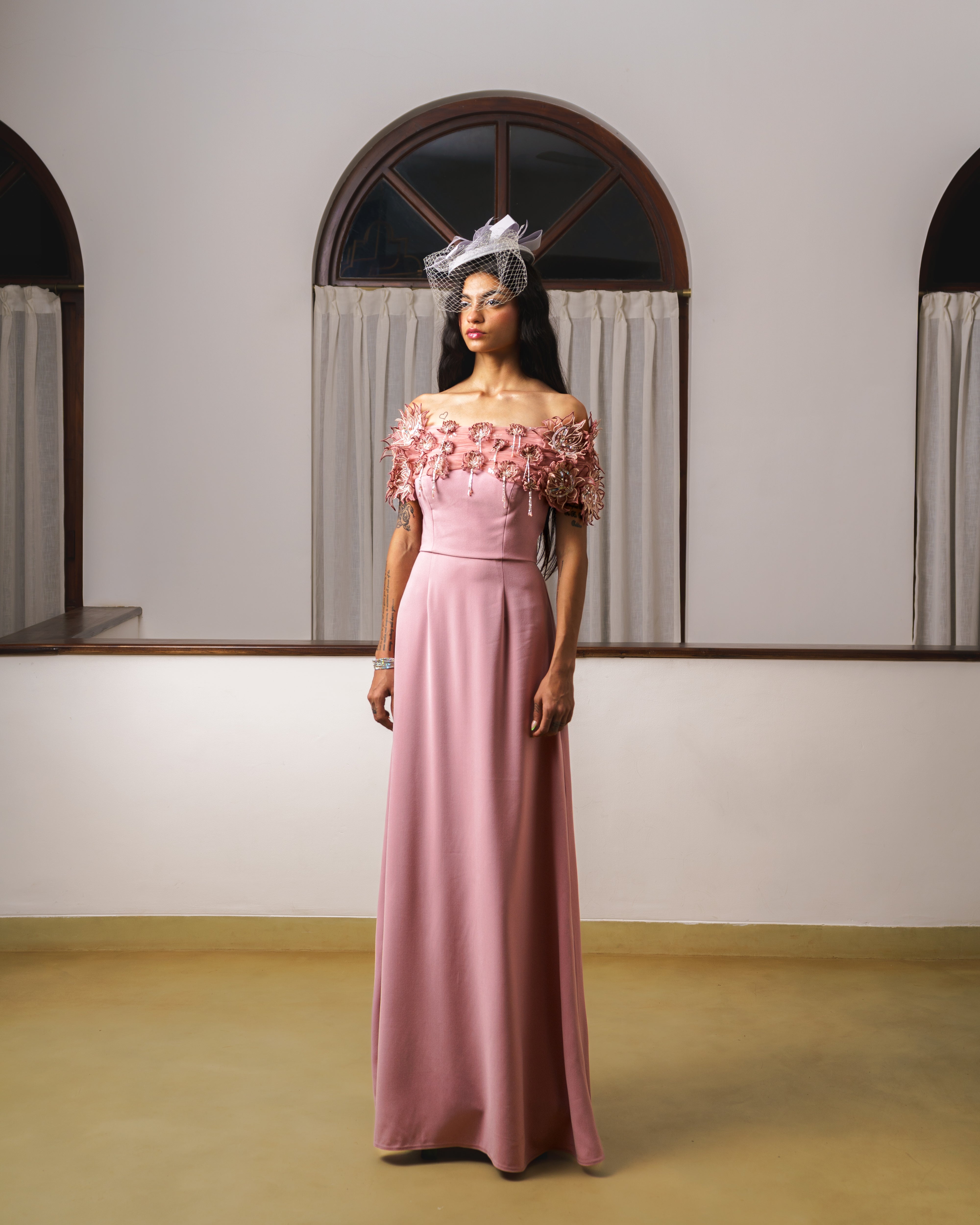 Off shoulder mermaid embroidered gown with lotus embellishments