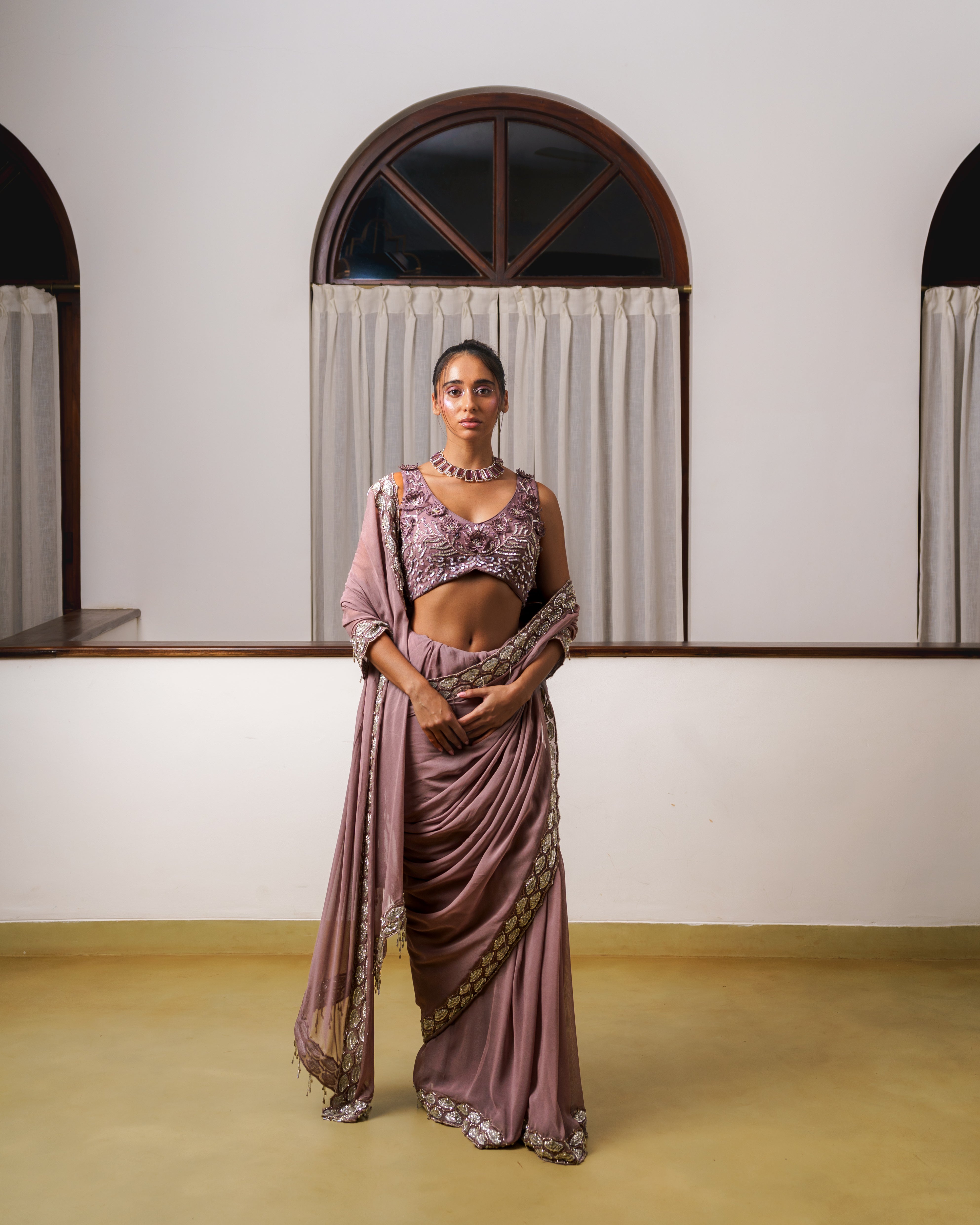 Hand embroidered saree with heavy border and embroidered lotus blouse