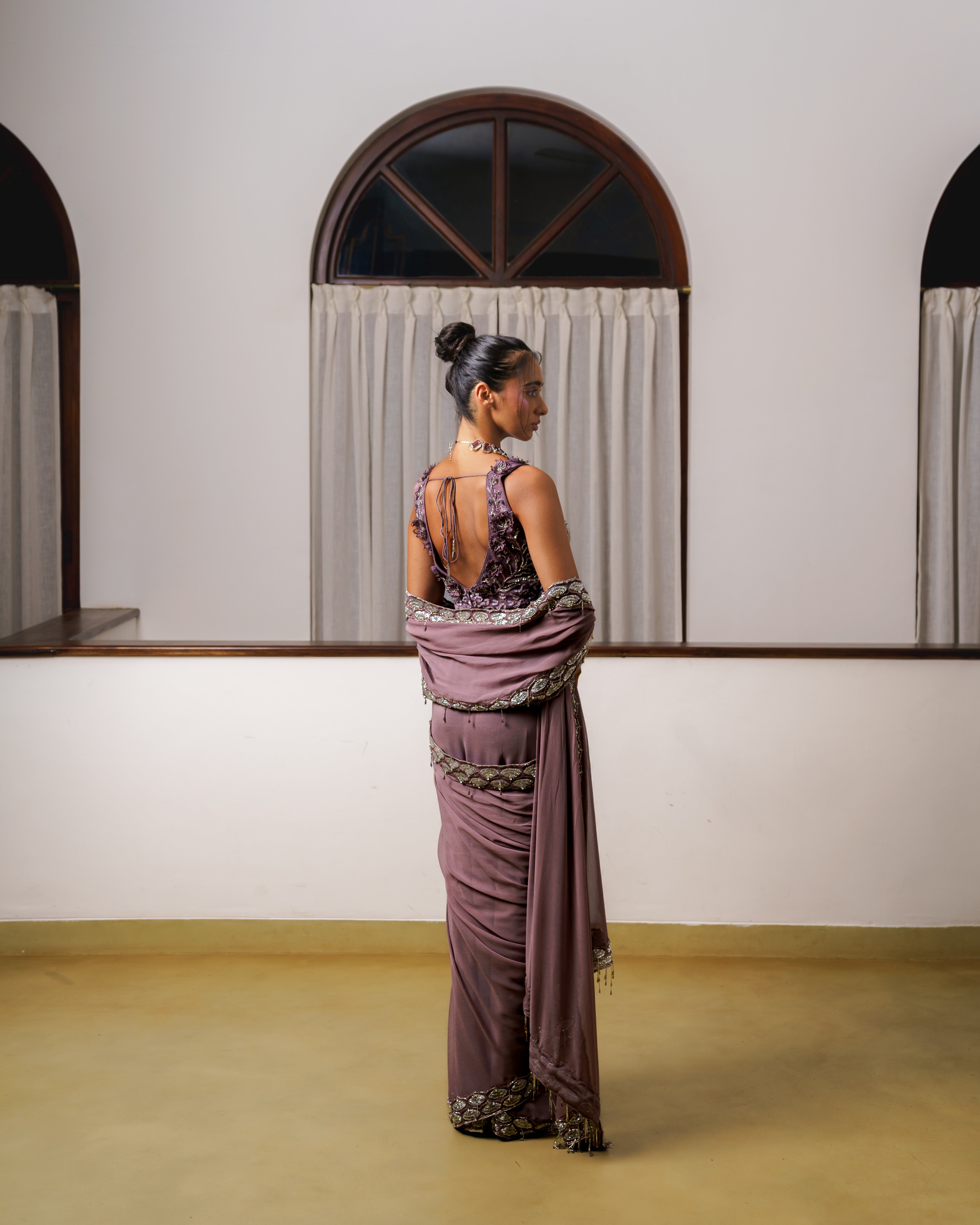 Hand embroidered saree with heavy border and embroidered lotus blouse