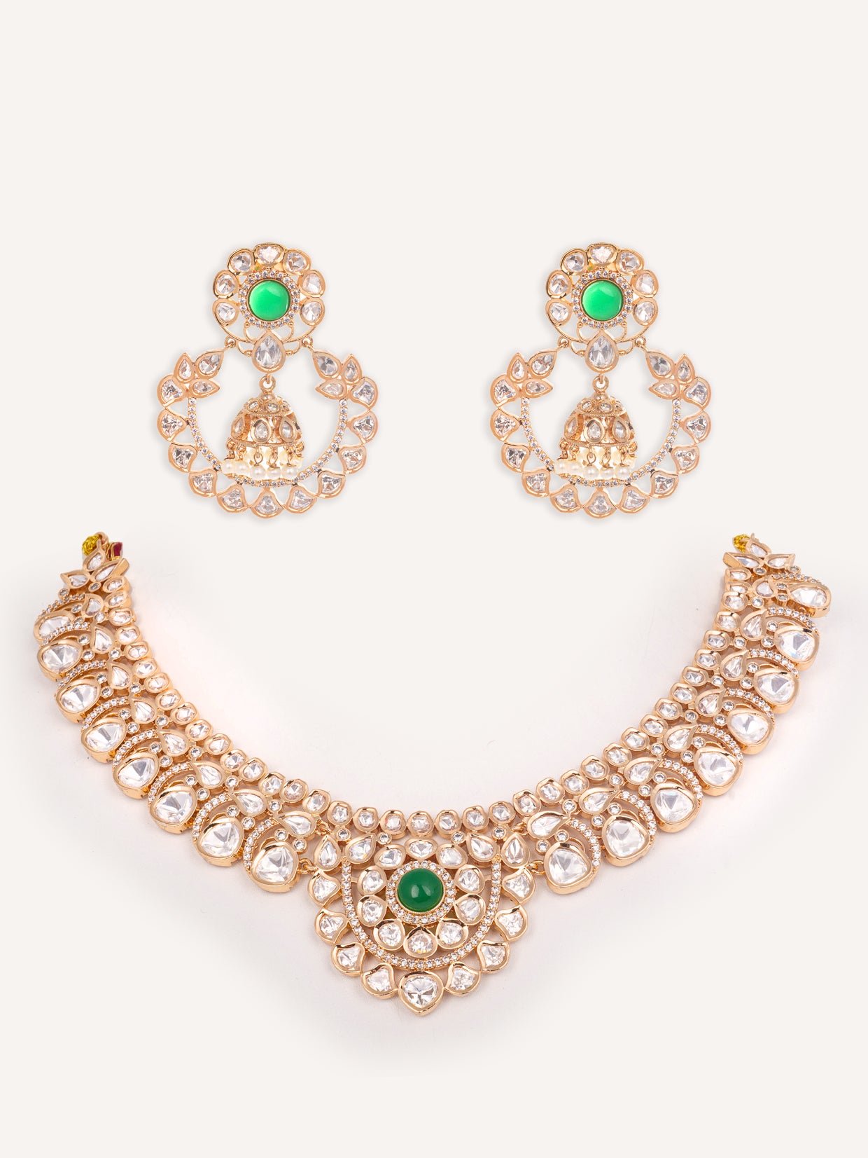 Elegant and stylish pendant necklace and earrings with green stone