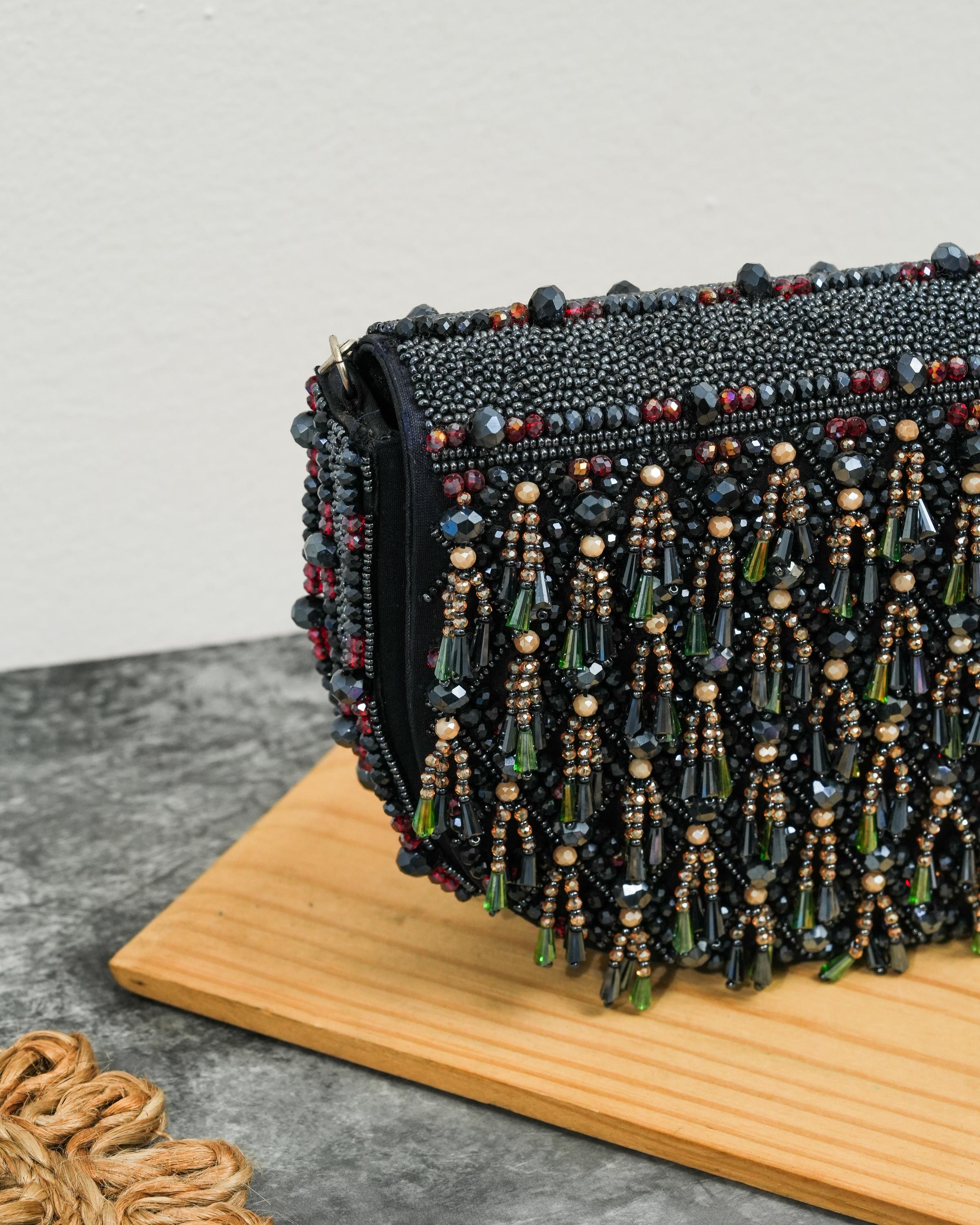 Semi circle tassle clutch