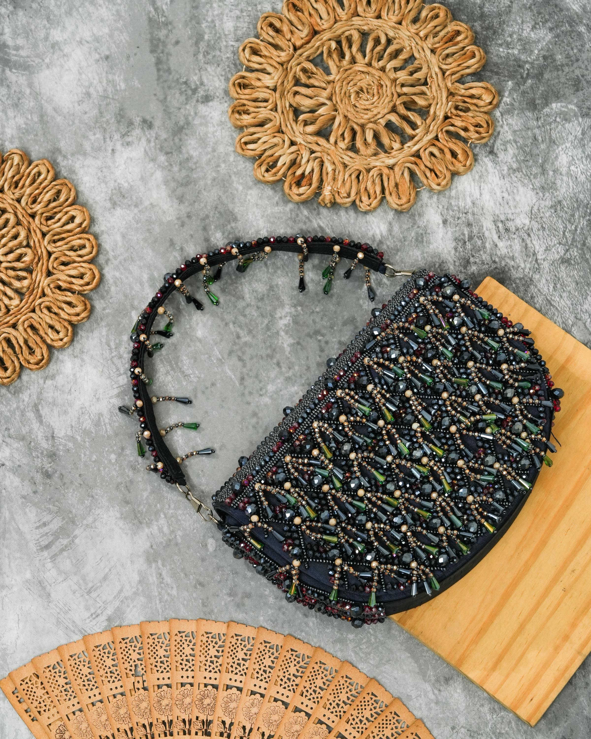 Semi circle tassle clutch