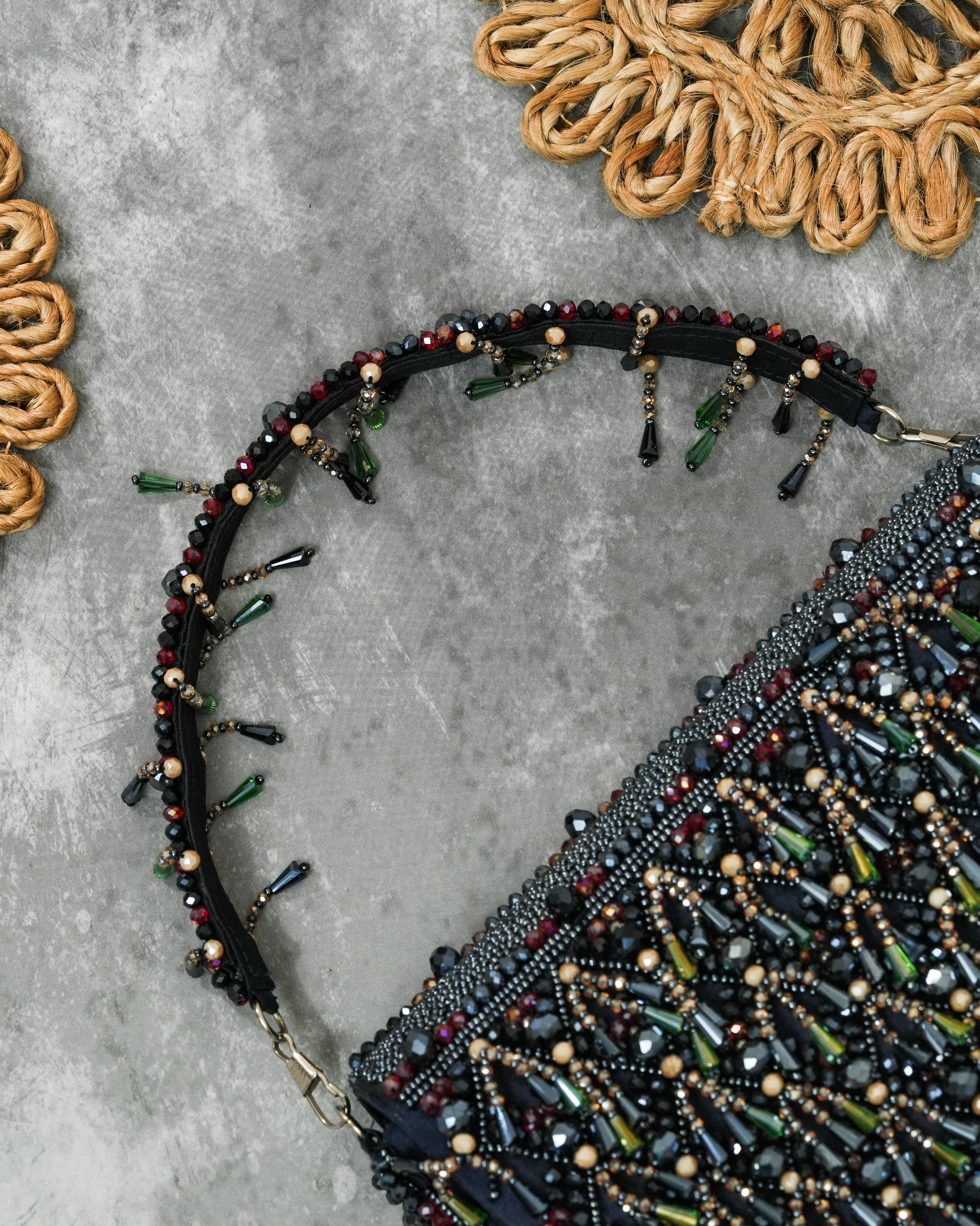 Semi circle tassle clutch
