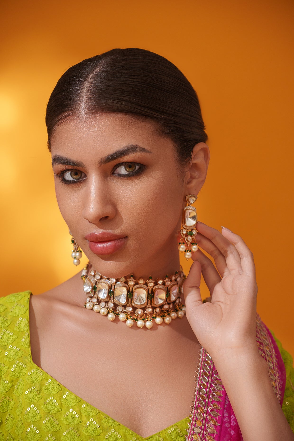 Bold and dramatic polki choker with matching earrings