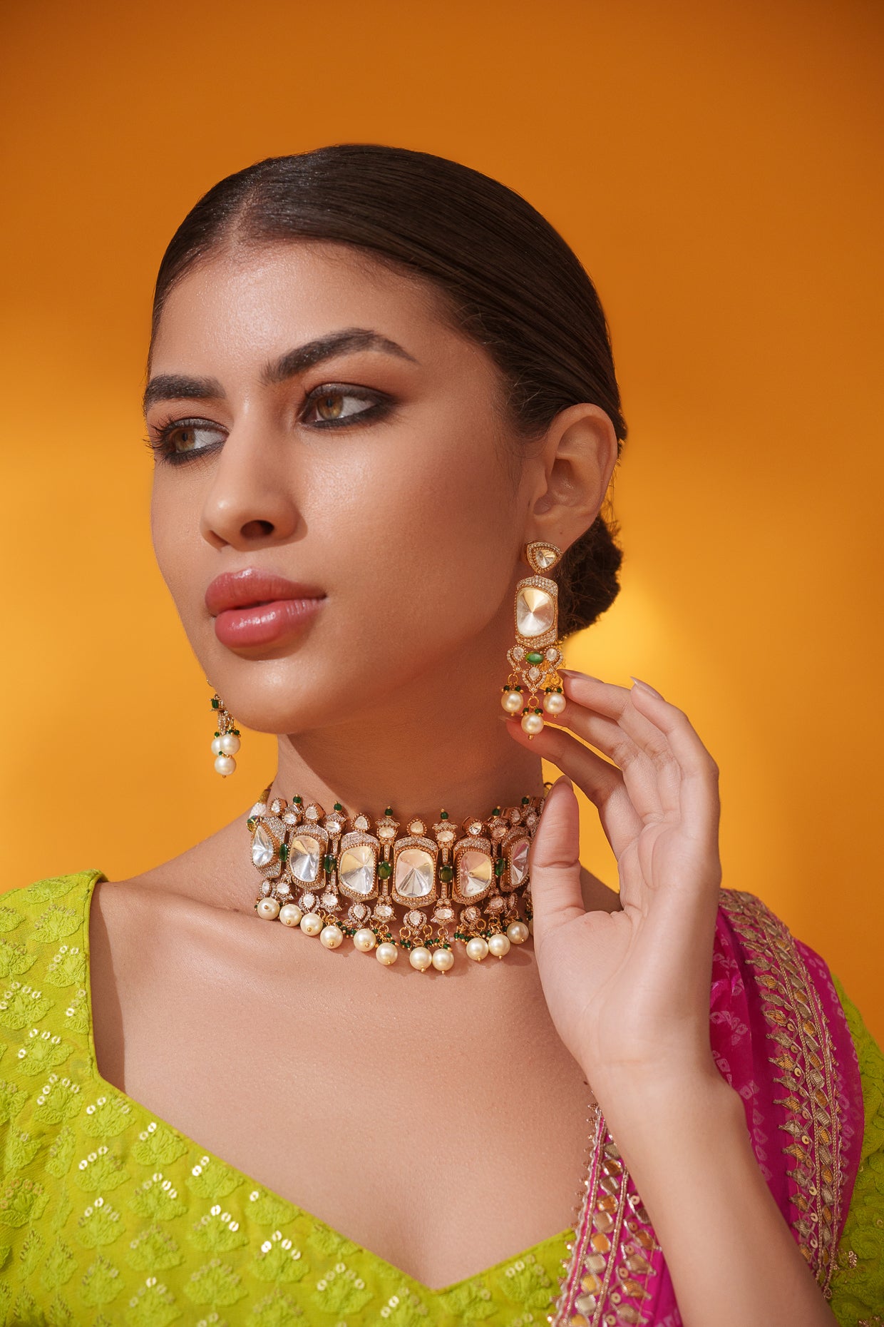 Bold and dramatic polki choker with matching earrings
