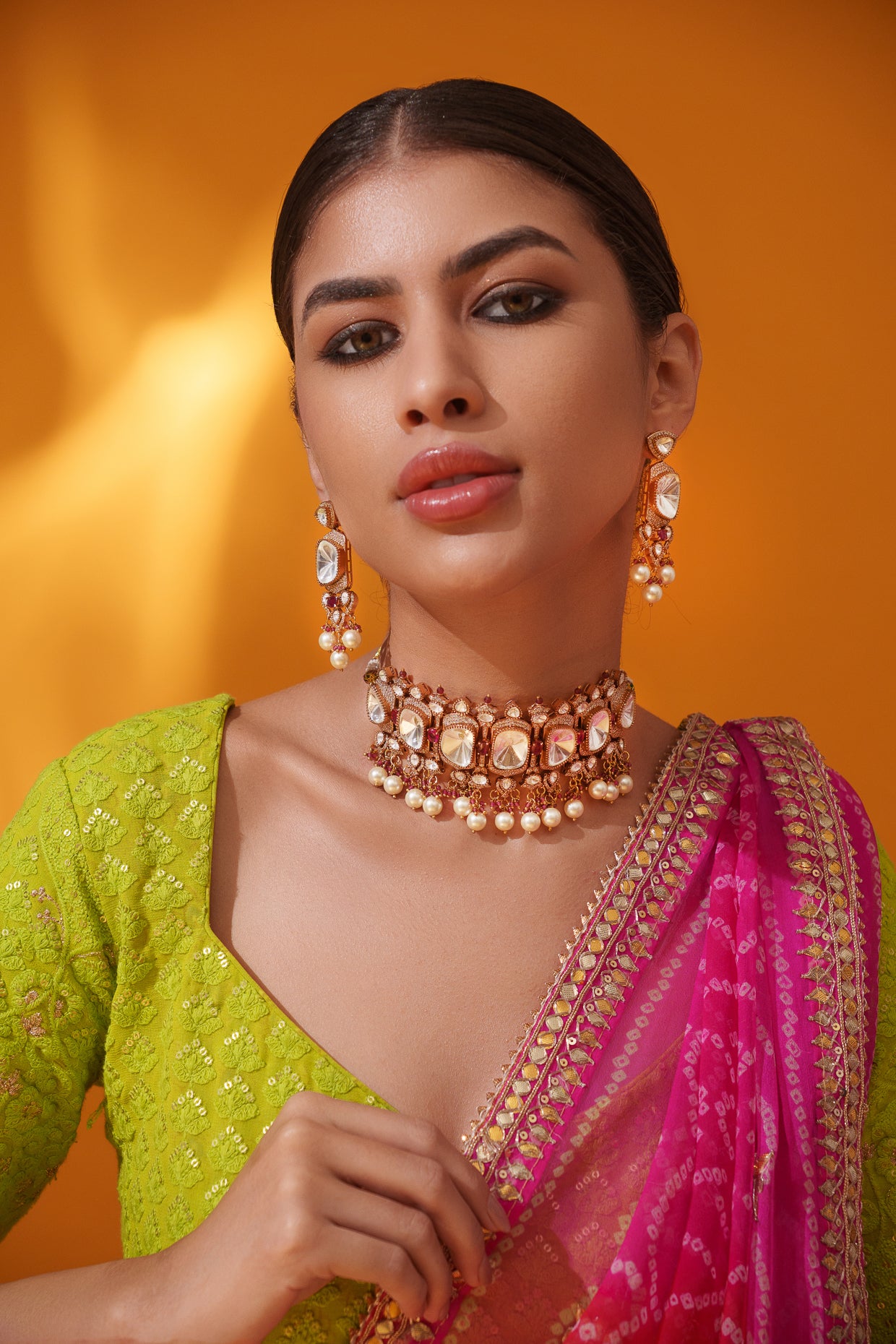 Bold and dramatic polki choker with matching earrings