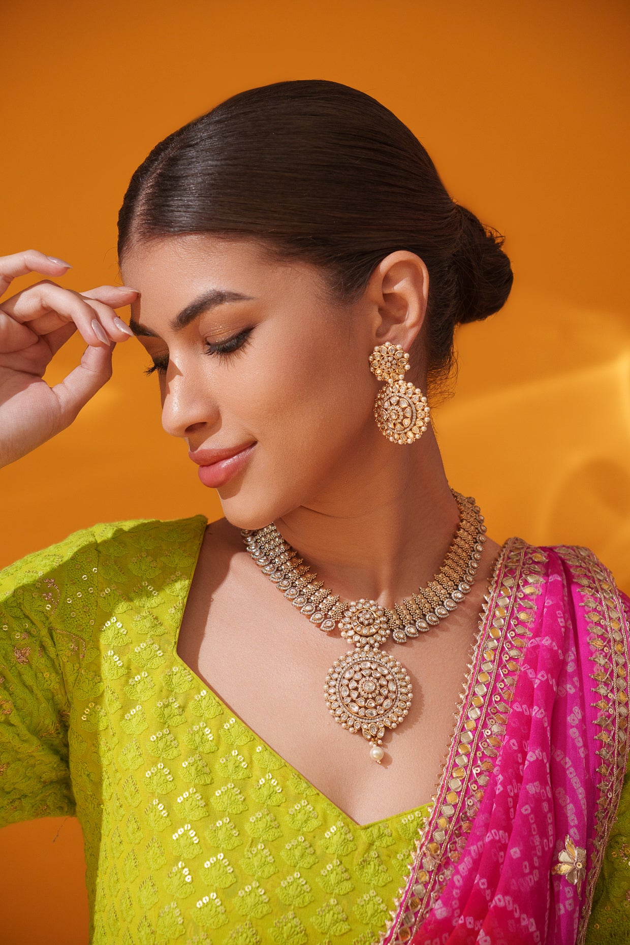 Bold and dramatic kundan pendant necklace with earrings