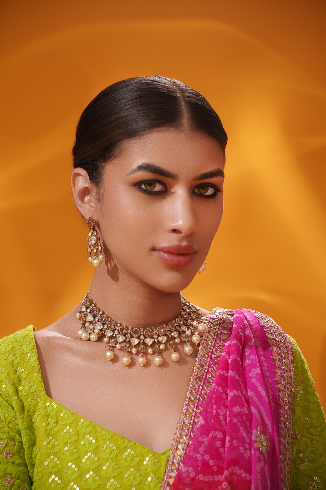 Dramatic and classy two tone kundan polki stone necklace set with matching earrings