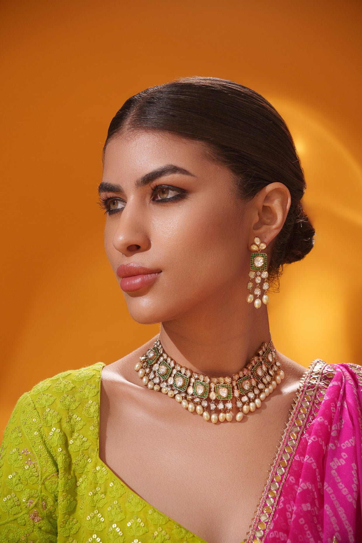 Dramatic and classy two tone kundan polki stone necklace set with matching earrings