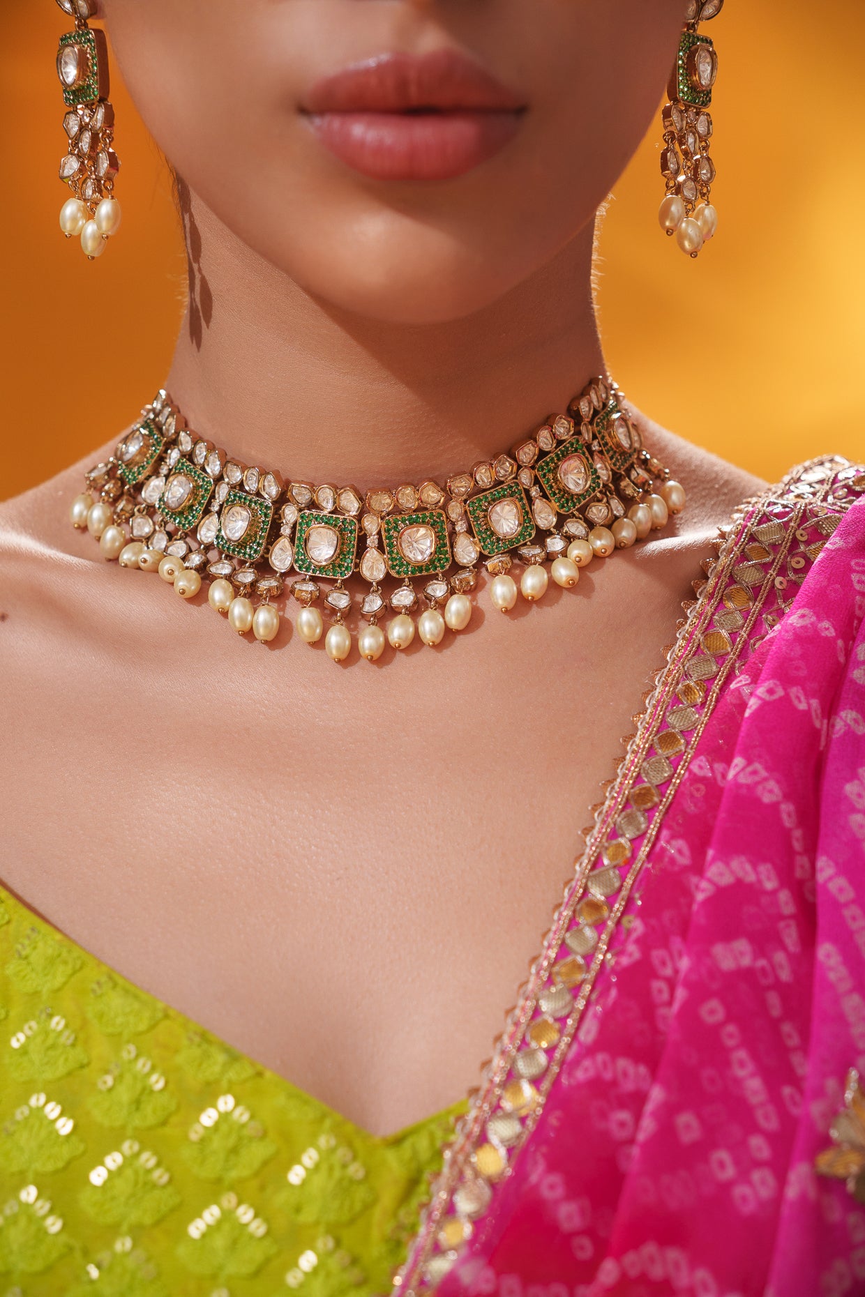 Dramatic and classy two tone kundan polki stone necklace set with matching earrings
