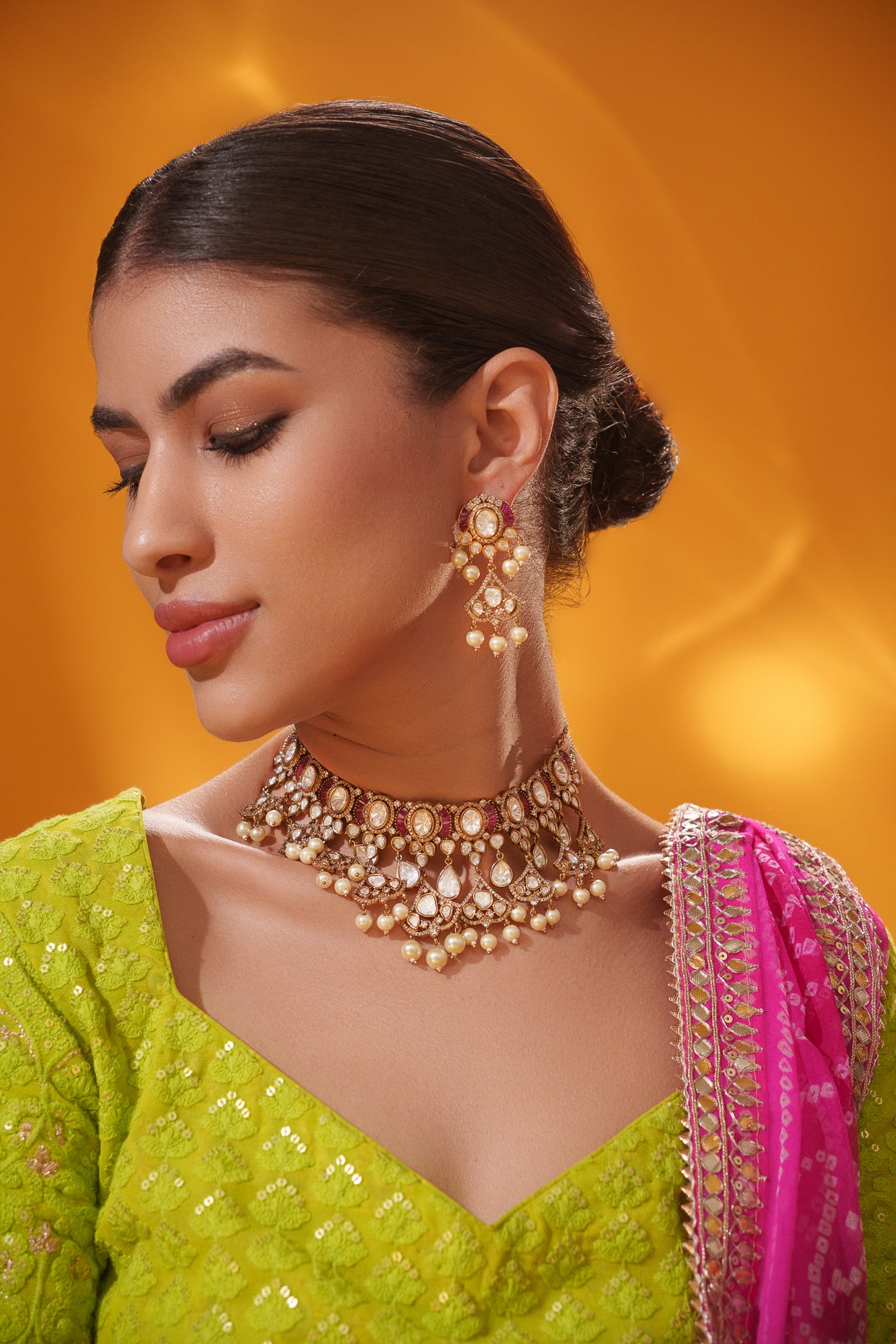 Dramatic and classy two tone kundan polki stone necklace set with matching earrings