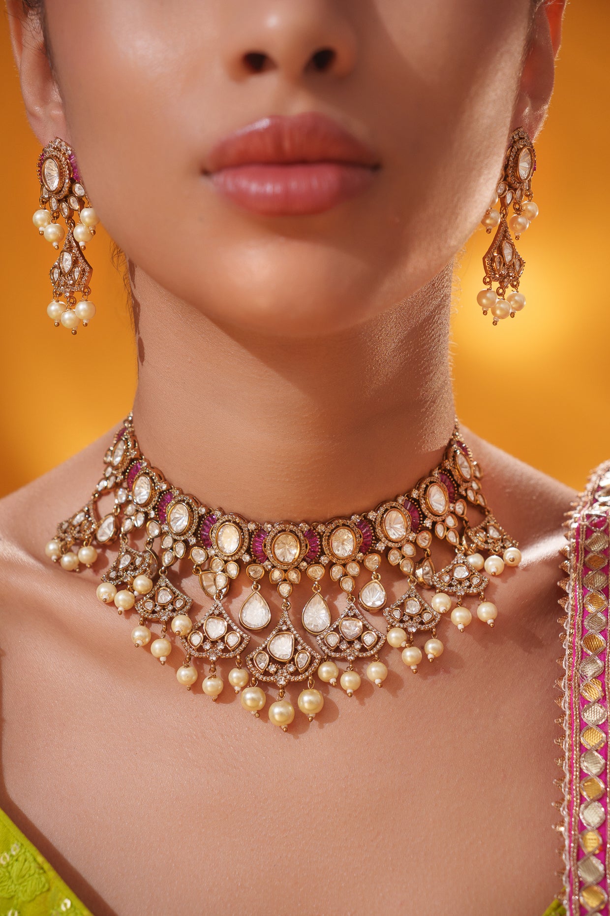 Dramatic and classy two tone kundan polki stone necklace set with matching earrings