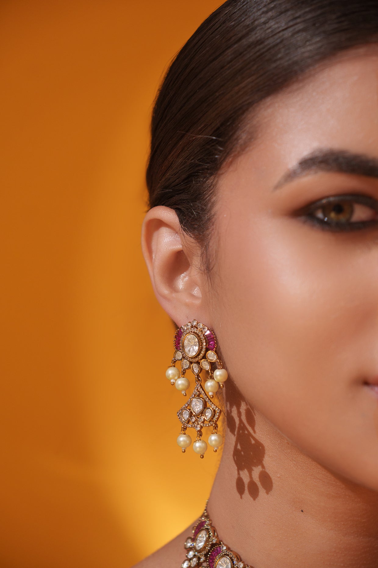 Dramatic and classy two tone kundan polki stone necklace set with matching earrings