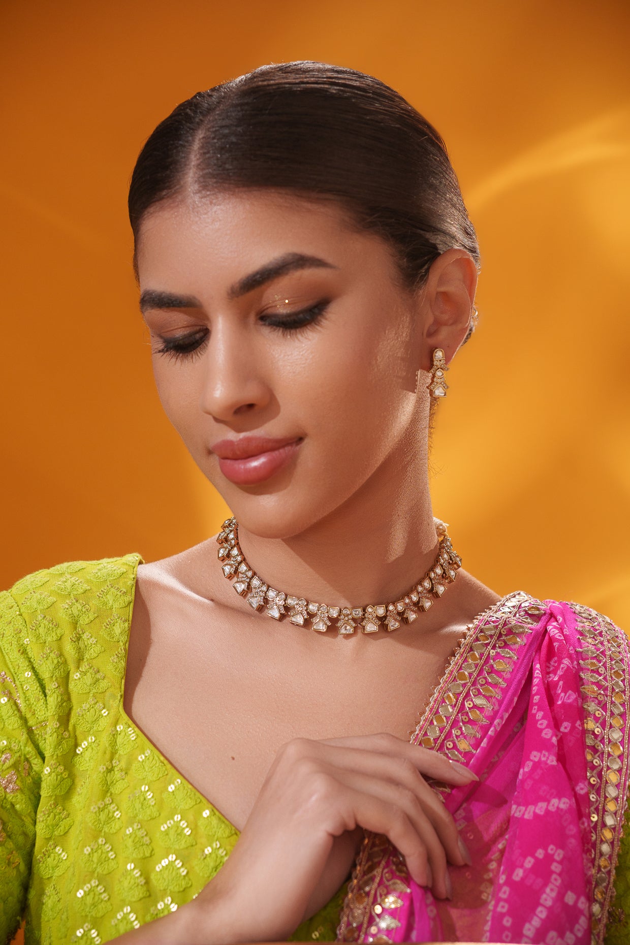 Dramatic and classy two tone kundan polki stone necklace set with matching earrings