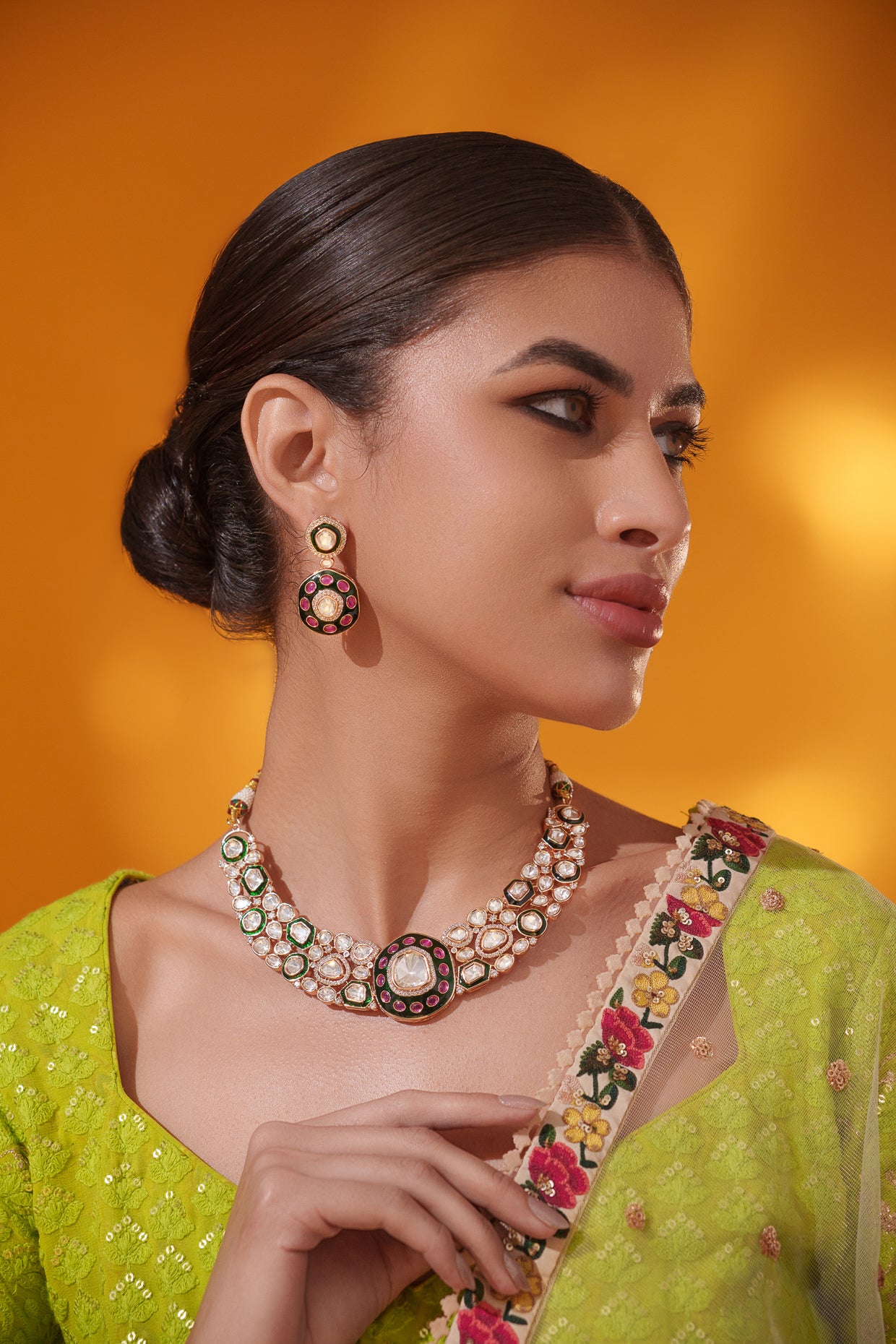 Classy kundan meena necklace set with elegant pair of earrings.