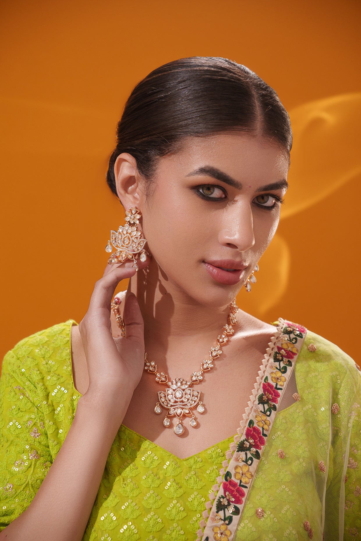 Stylish and classic kundan necklace set with matching earrings