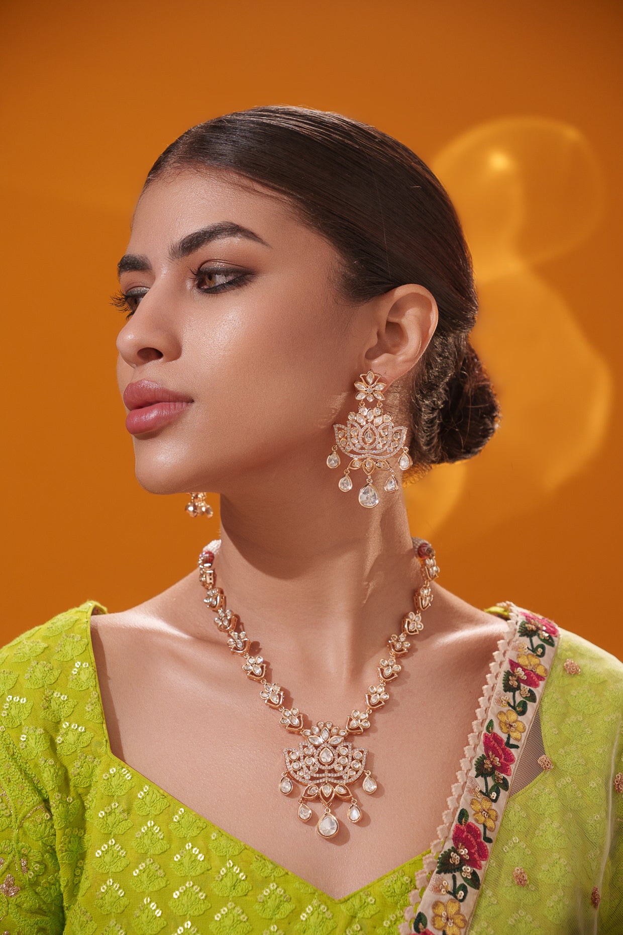 Stylish and classic kundan necklace set with matching earrings