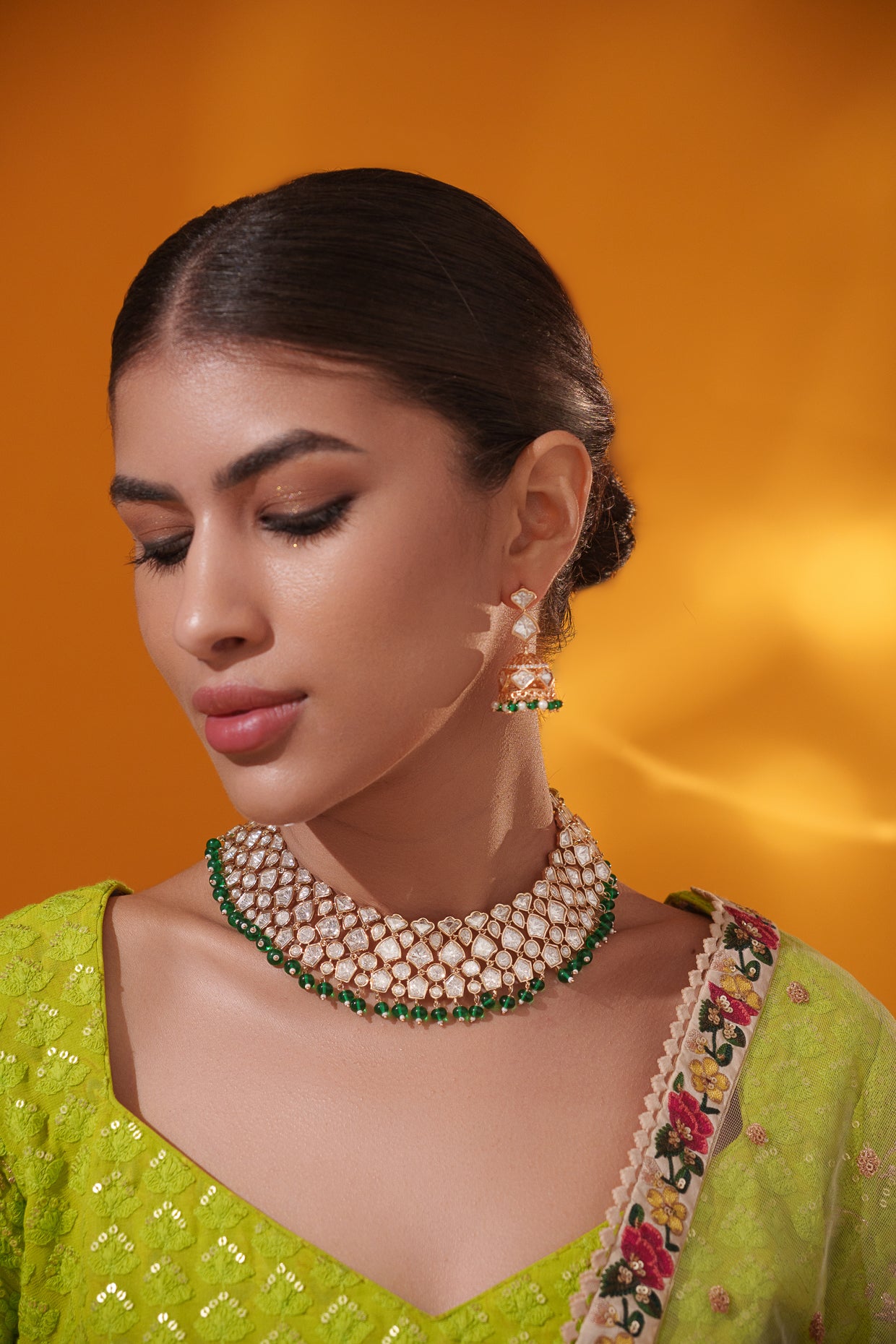 Stylish and classic kundan necklace set with matching earrings