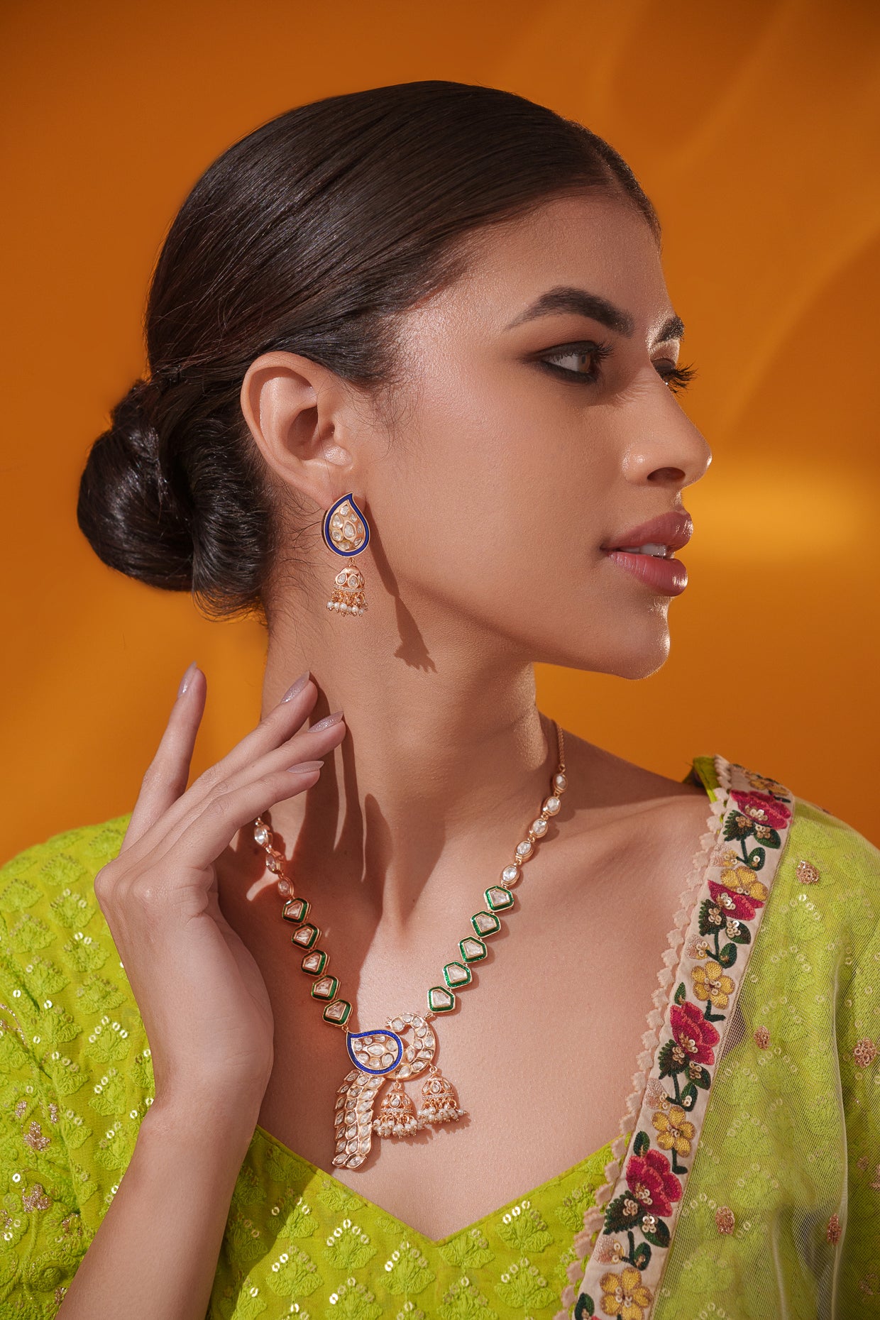Stylish and classic kundan necklace set with matching earrings