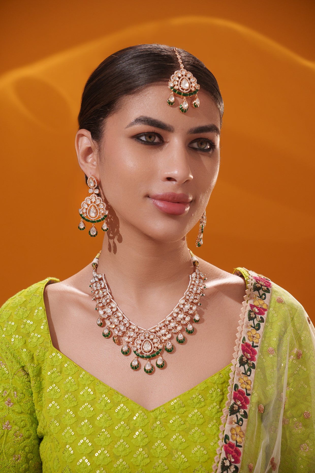 Dramatic and stylish kundan necklace set with matching earrings