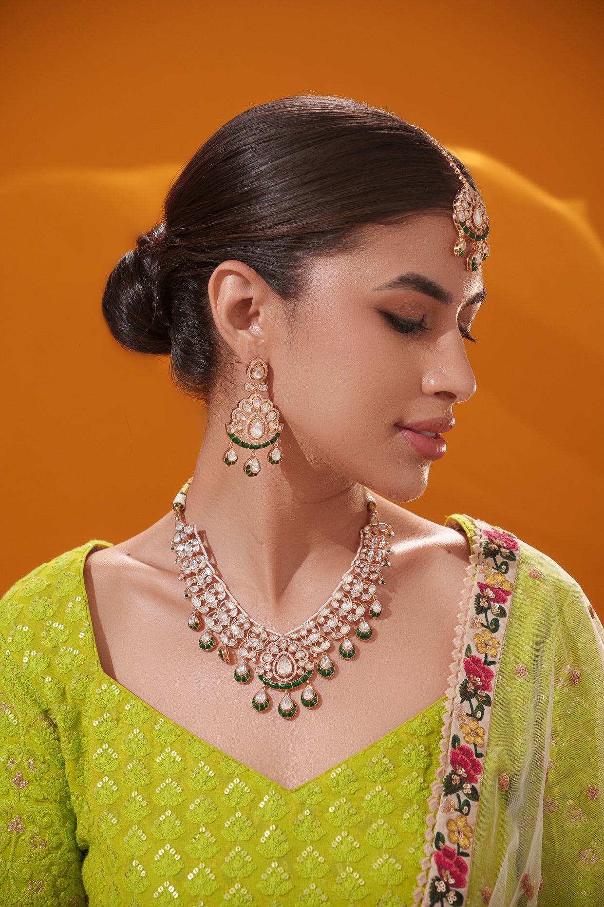 Dramatic and stylish kundan necklace set with matching earrings