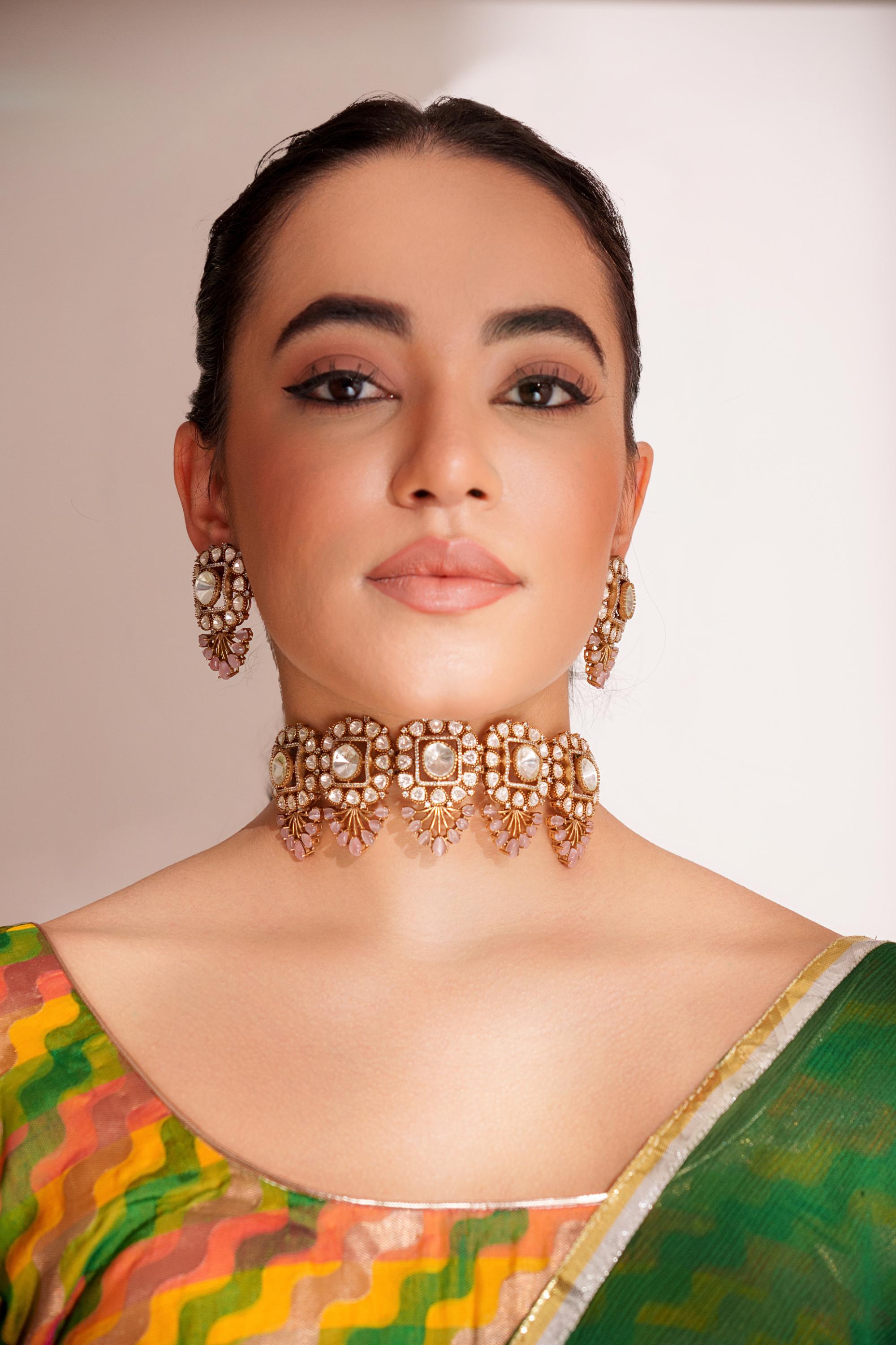 Bold and dramatic two tone finish polki choker set