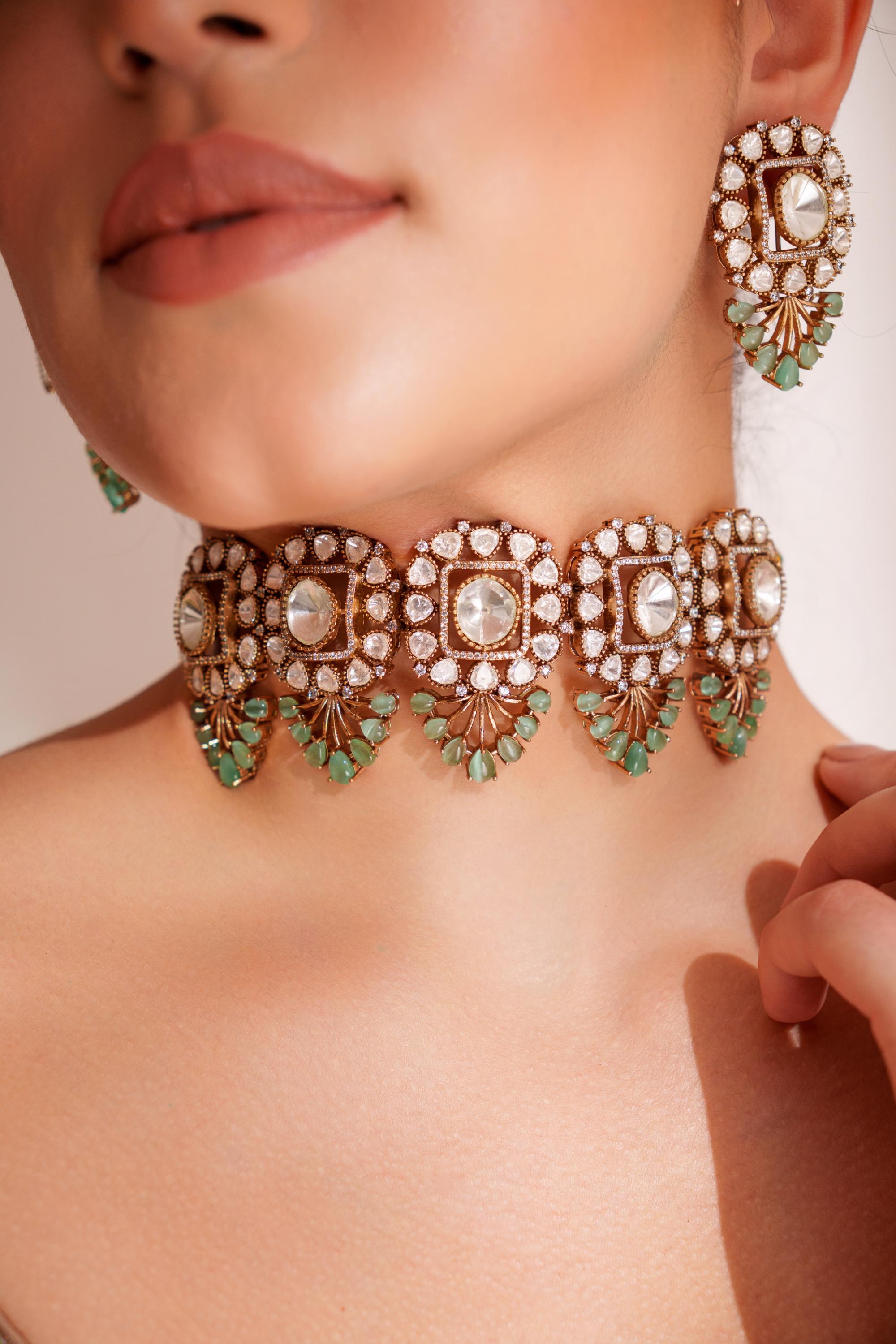 Bold and dramatic two tone finish polki choker set