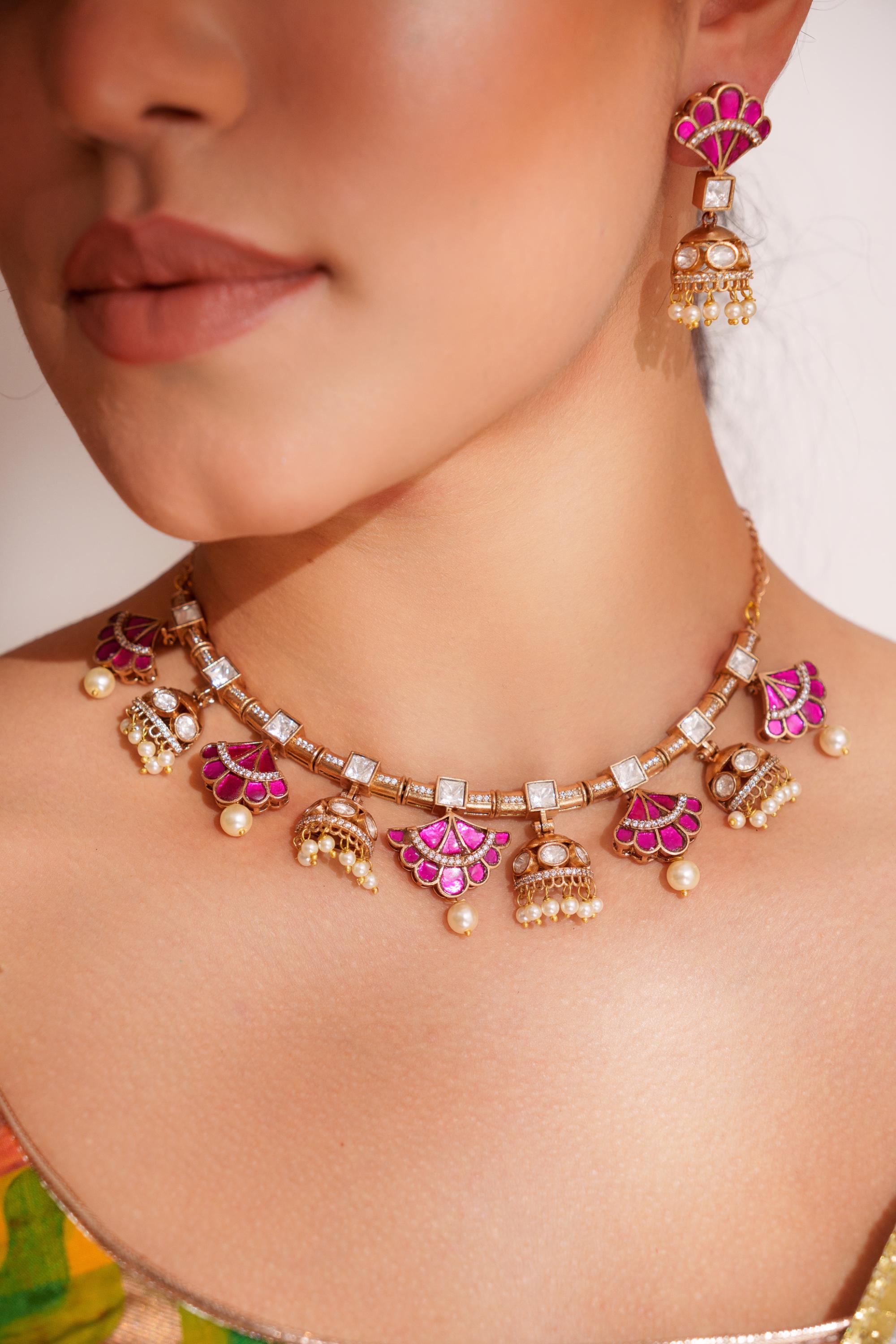 Elegant and stylish gold finish kundan polki necklace set