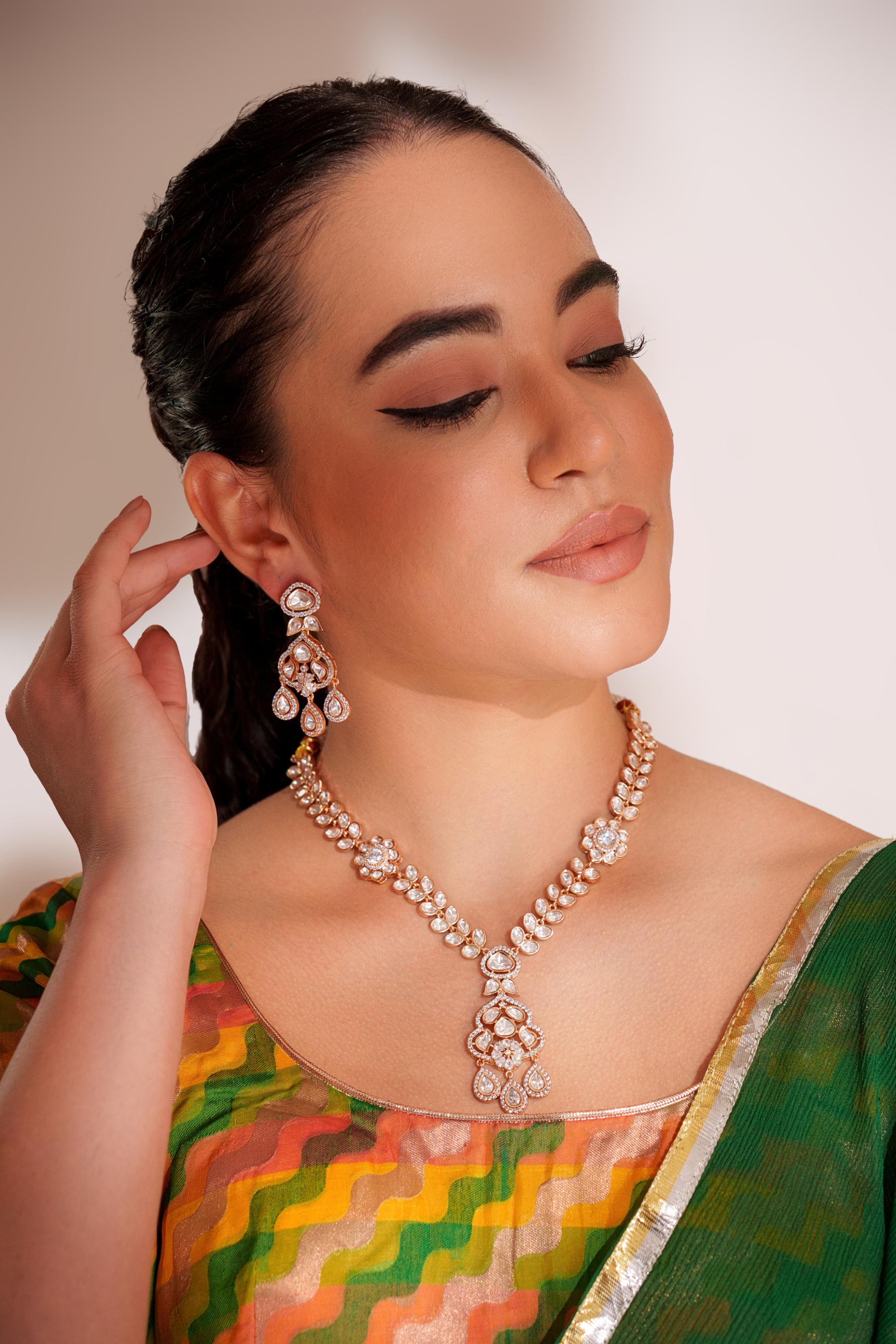 Bold and dramatic kundan long pendant necklace with elegant earrings