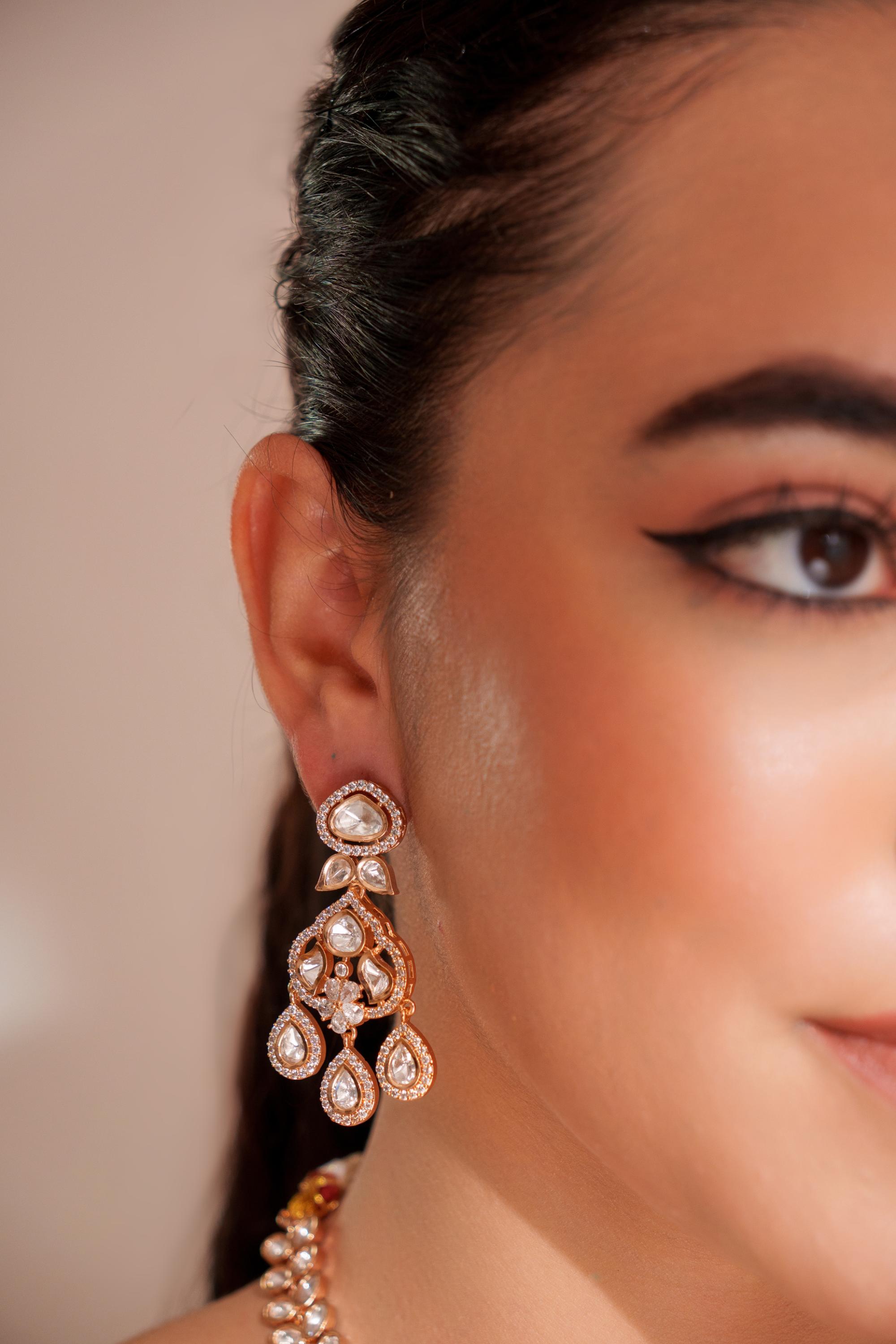 Bold and dramatic kundan long pendant necklace with elegant earrings