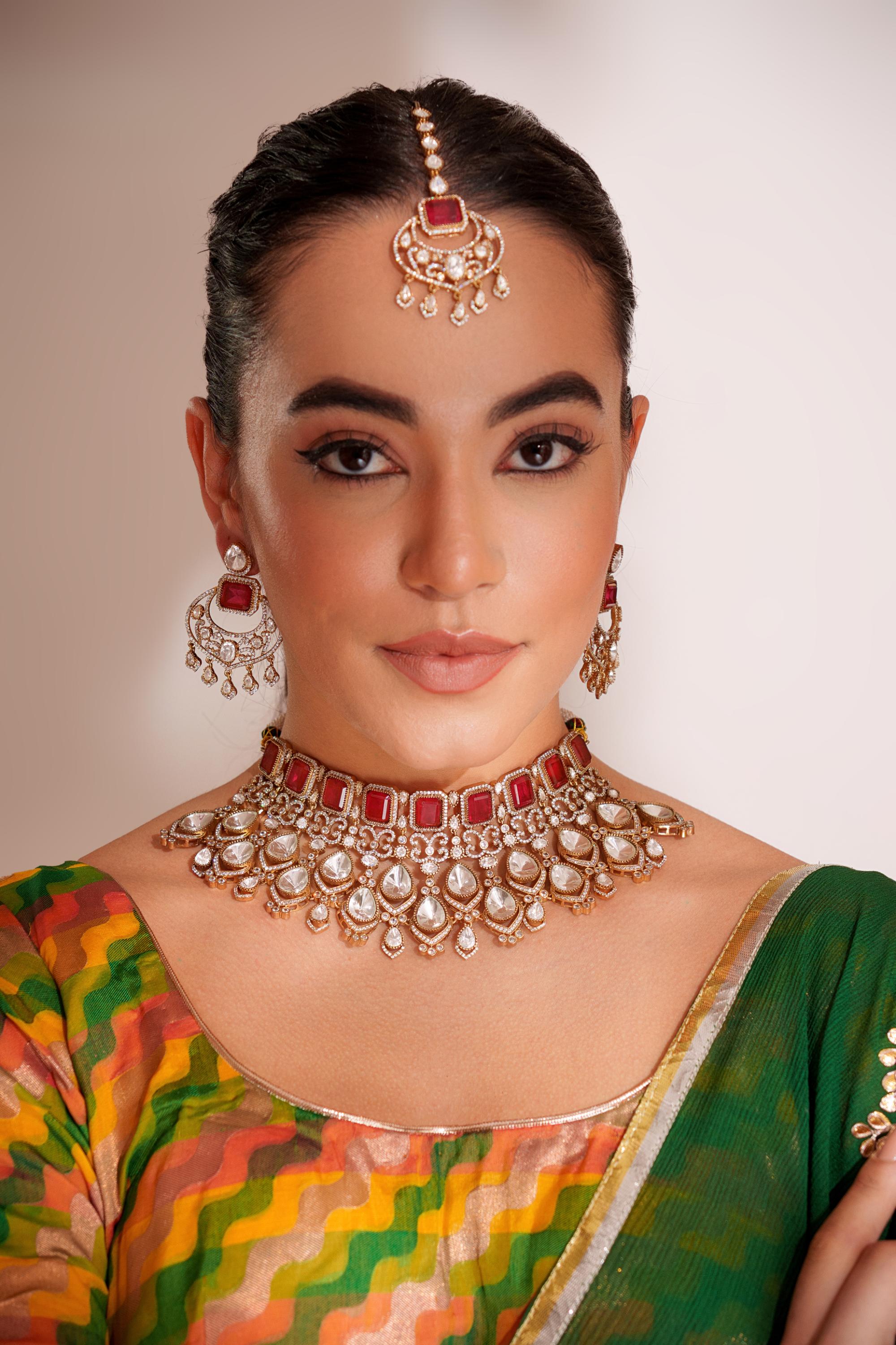 Bold and dramatic kundan necklace with earrings and maangtikka