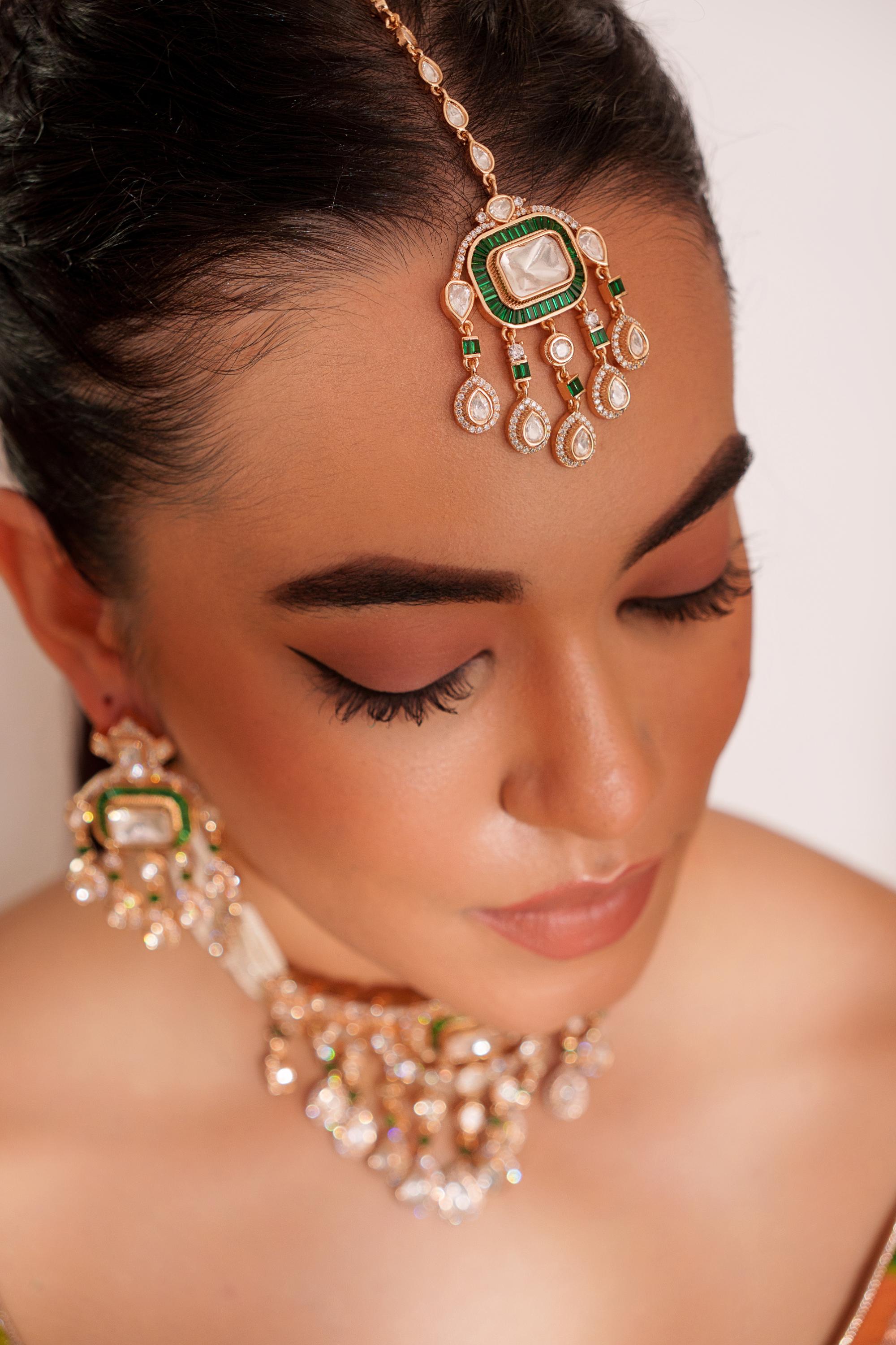 Bold and dramatic two tone finish polki choker set