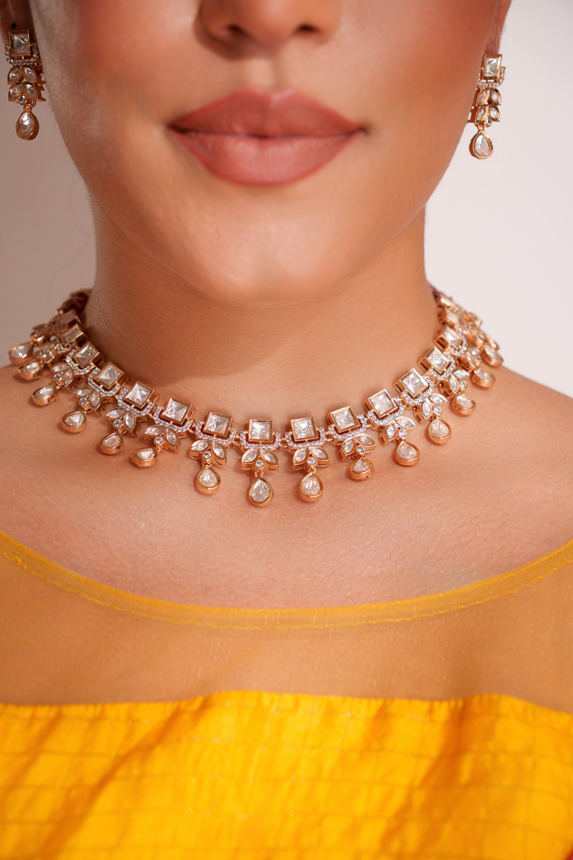 Dramatic and stylish kundan necklace set with matching earrings