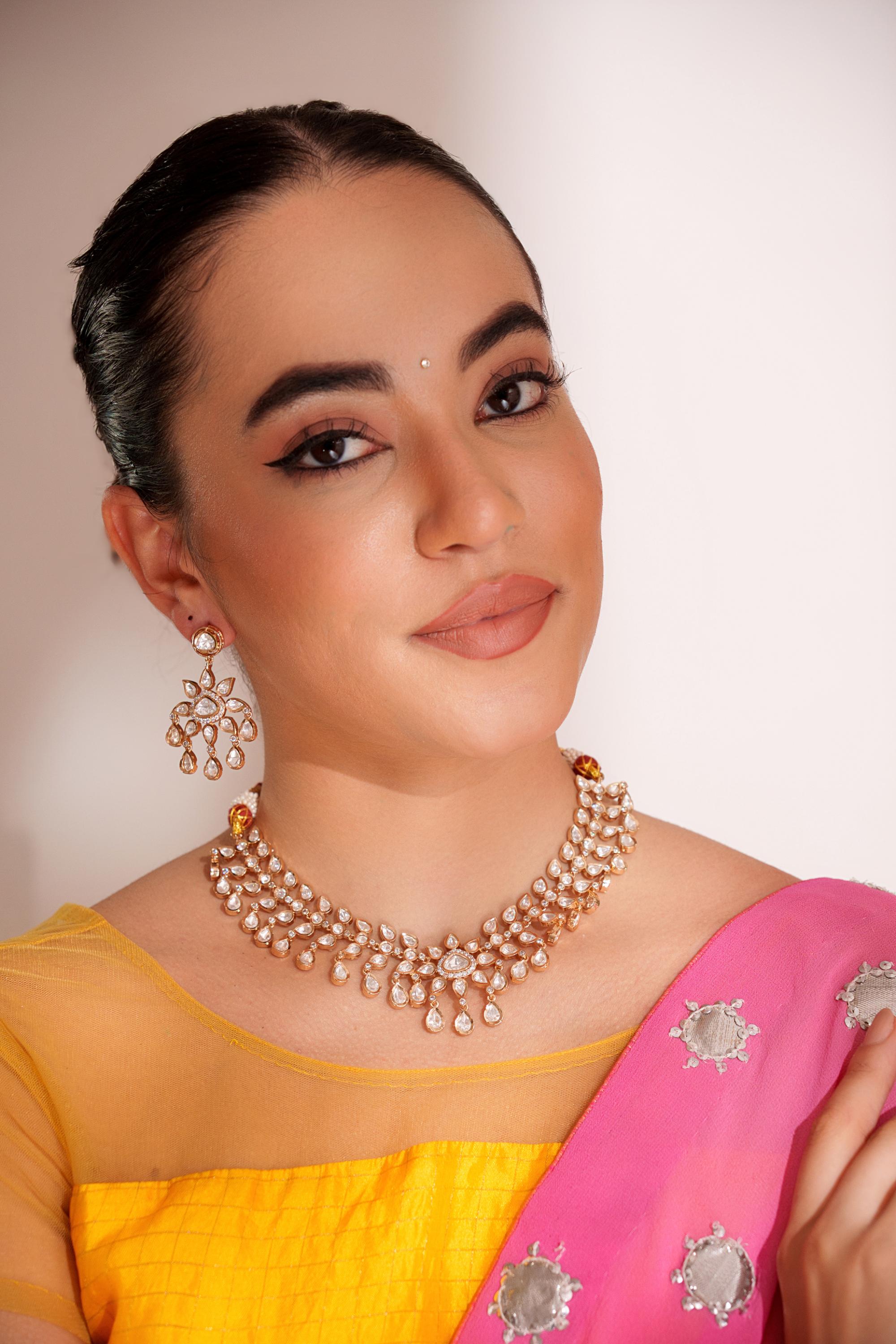 Classy kundan choker set with elegant pair of earrings