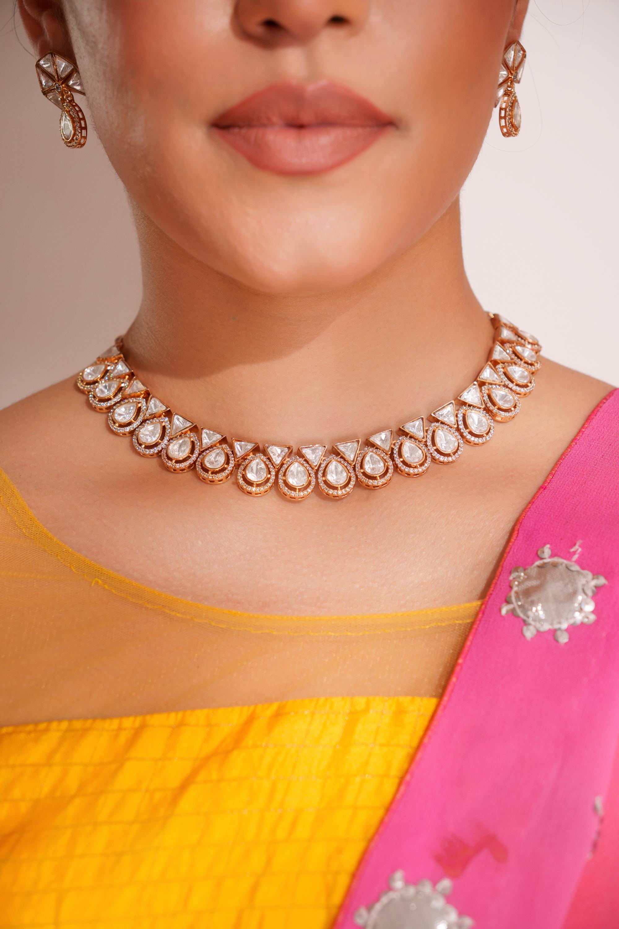 Elegant and stylish gold finish kundan polki necklace set